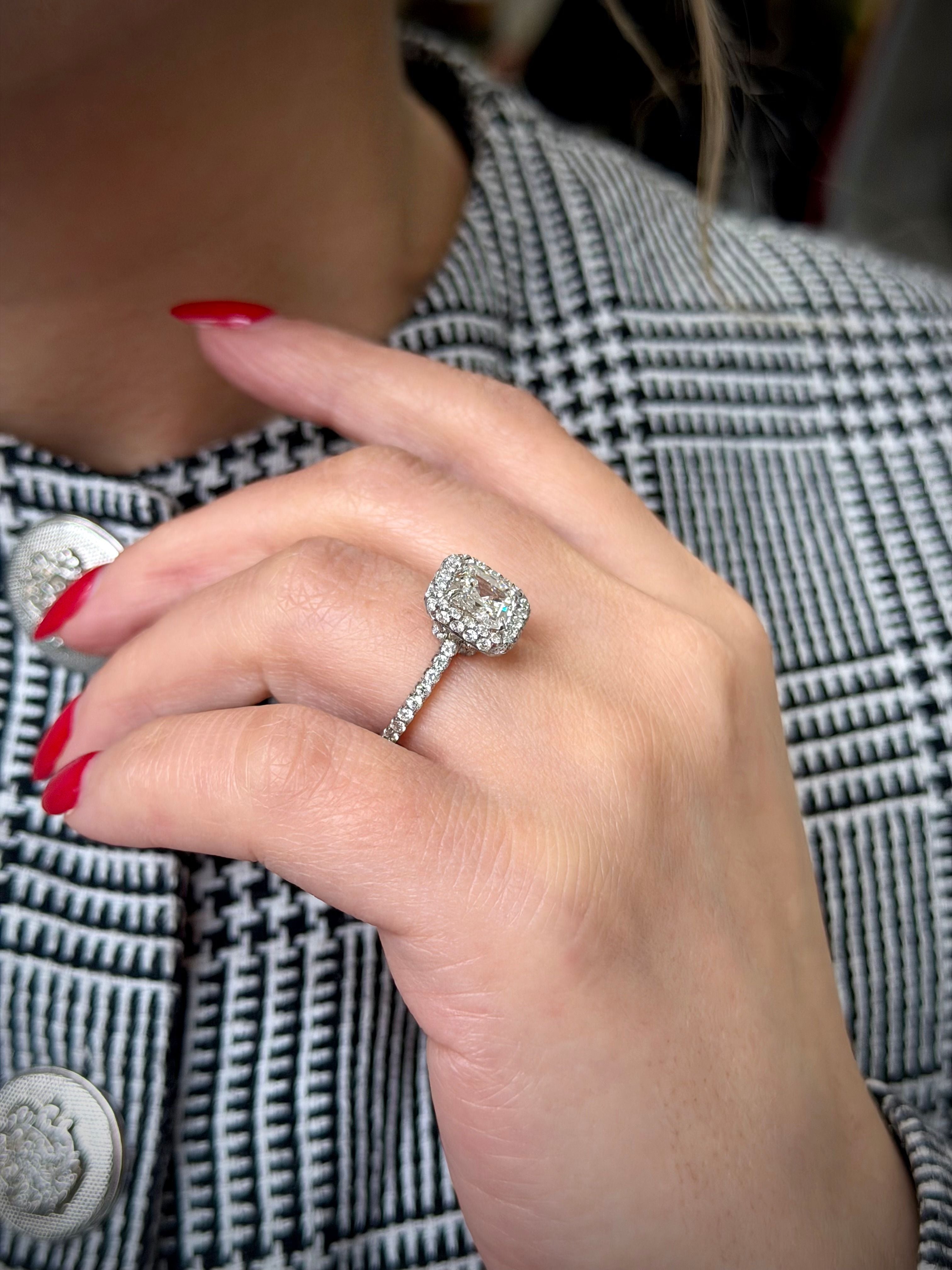 2.01ct Emerald Cut Diamond Halo Ring