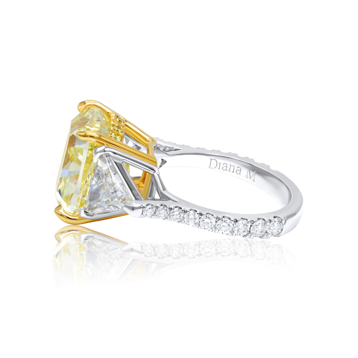 10.01ct cushion cut yellow diamond three-stone ring