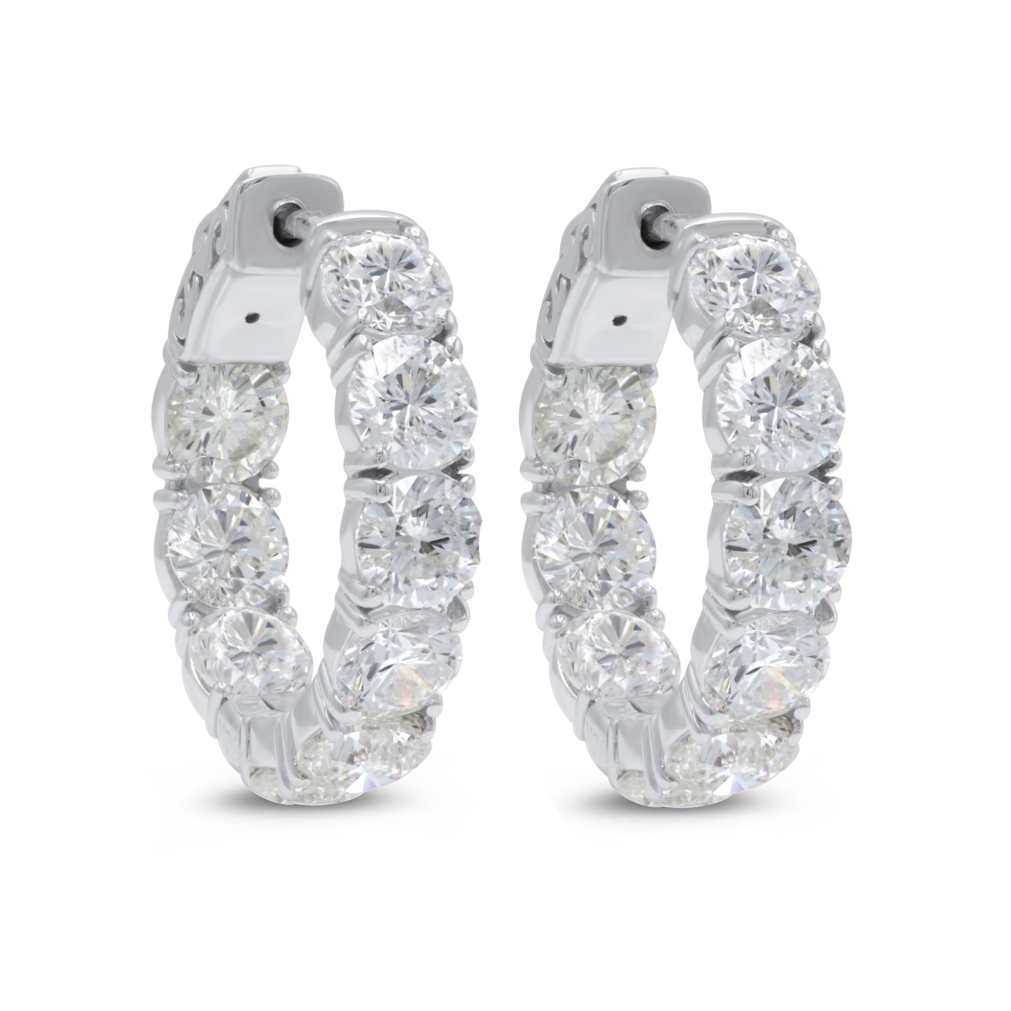 diamond hoop earrings on ears