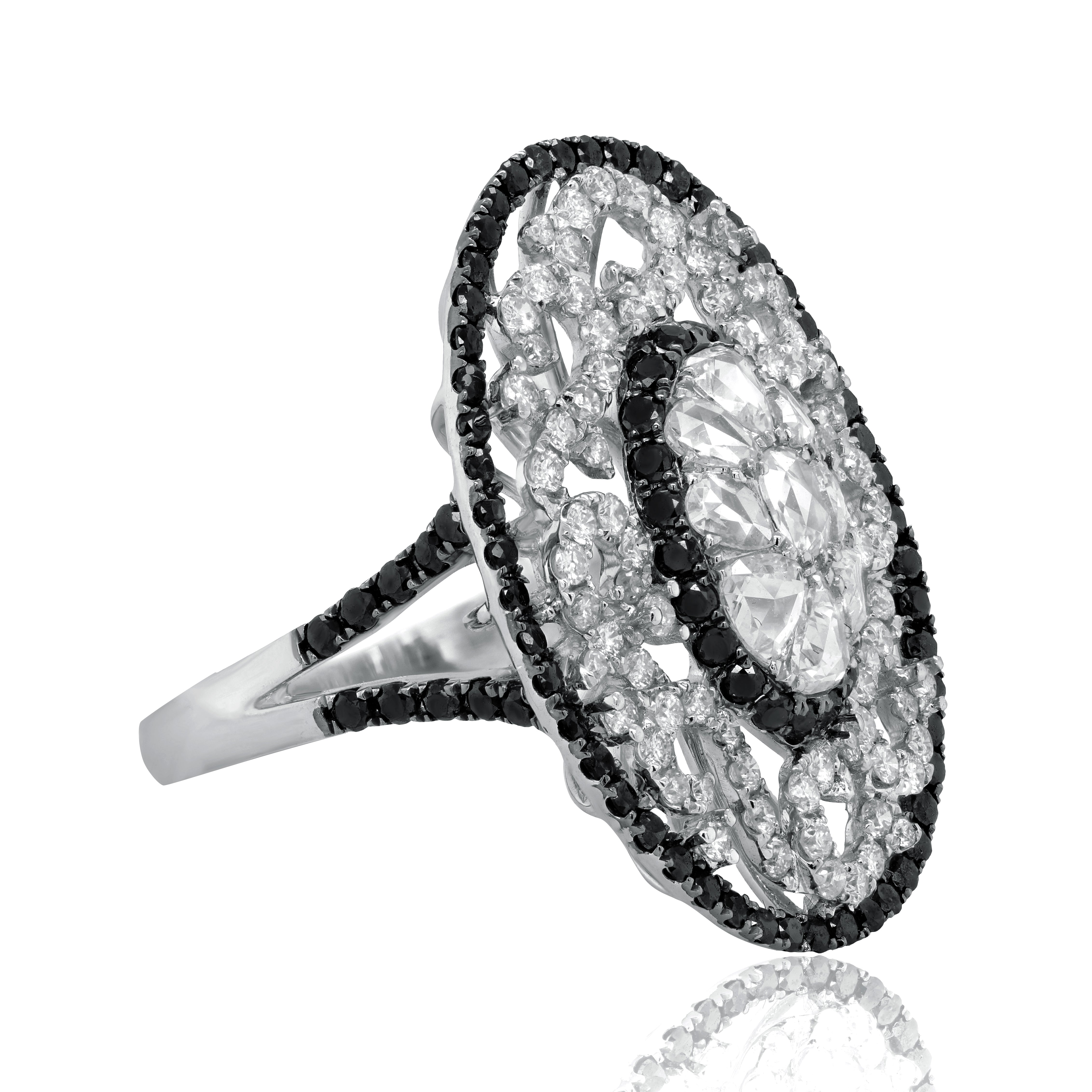 18kt white gold spiral diamond ring with black and white diamonds