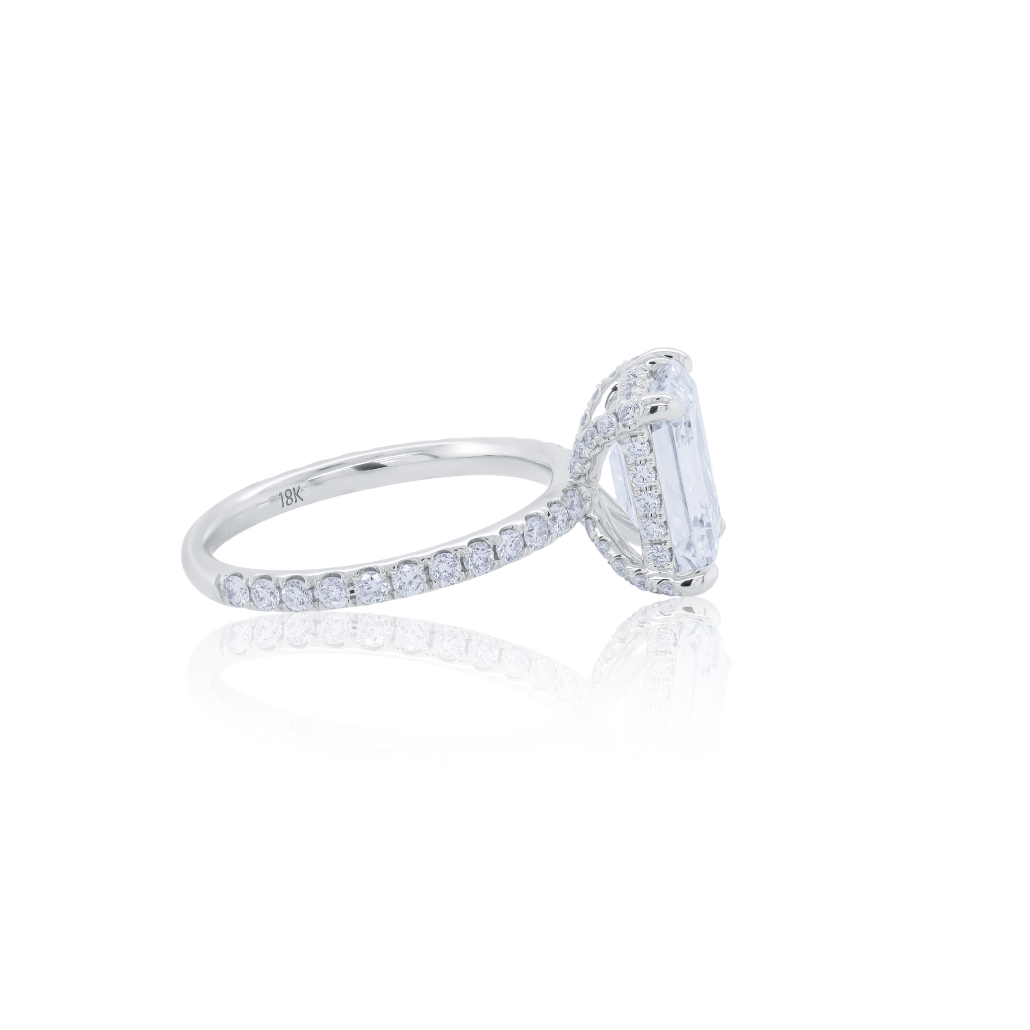 2.71ct emerald cut diamond ring in 18kt white gold with pavé band