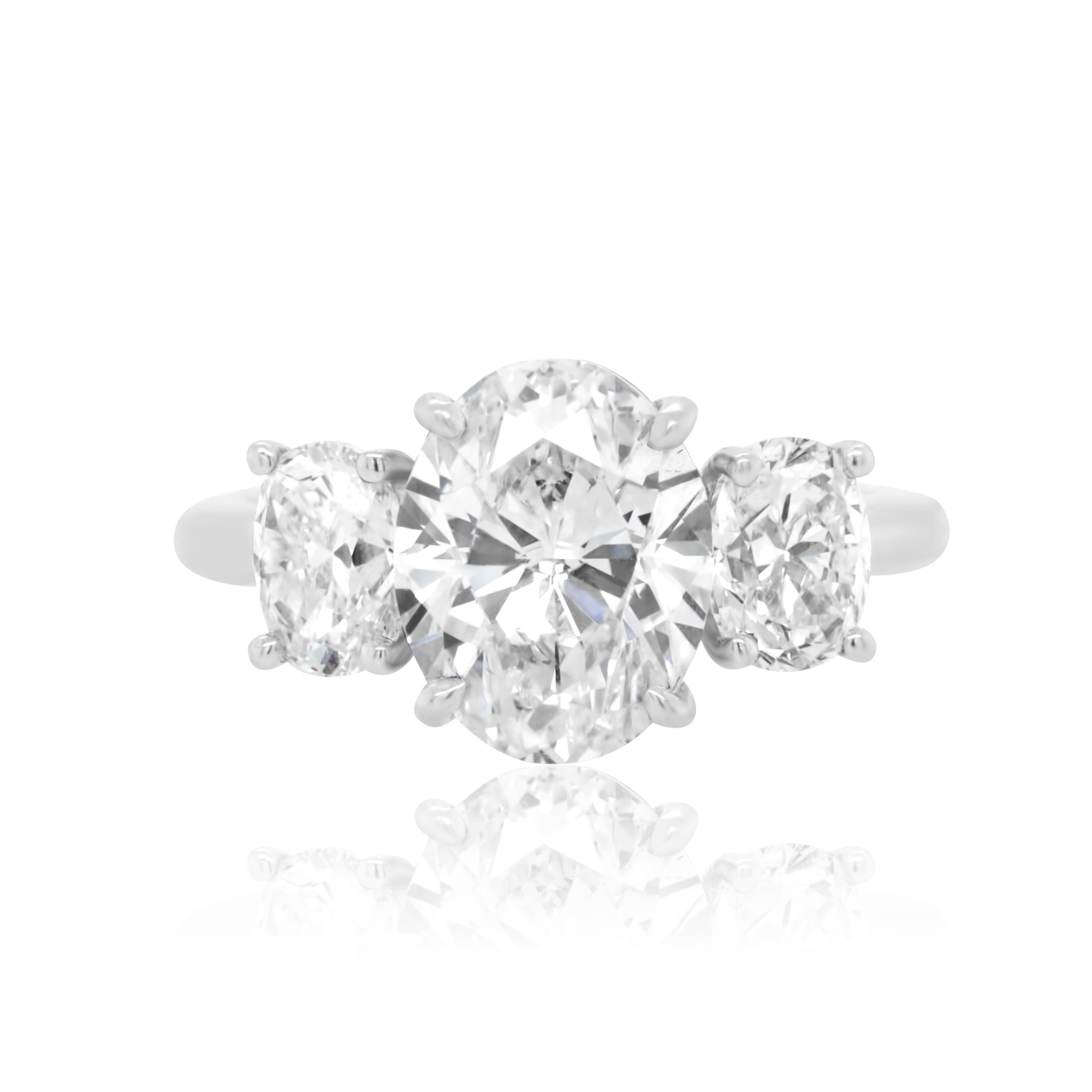 three stone engagement ring gold