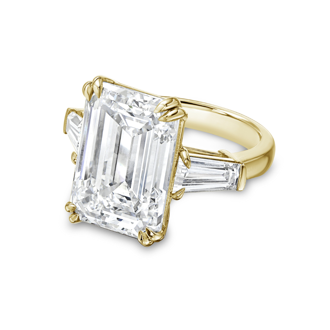 3 stone emerald cut diamond ring