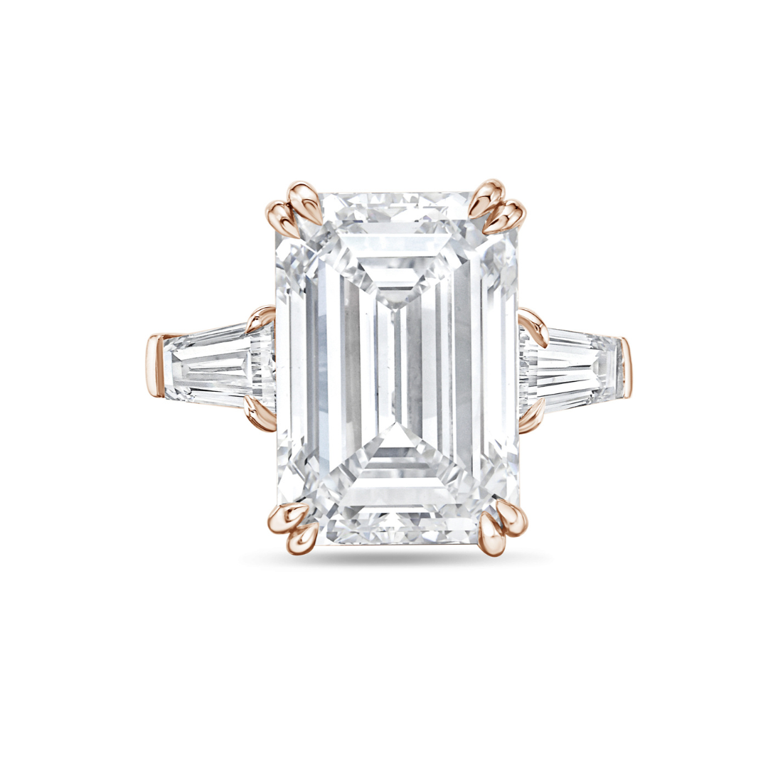 3 stone emerald cut ring