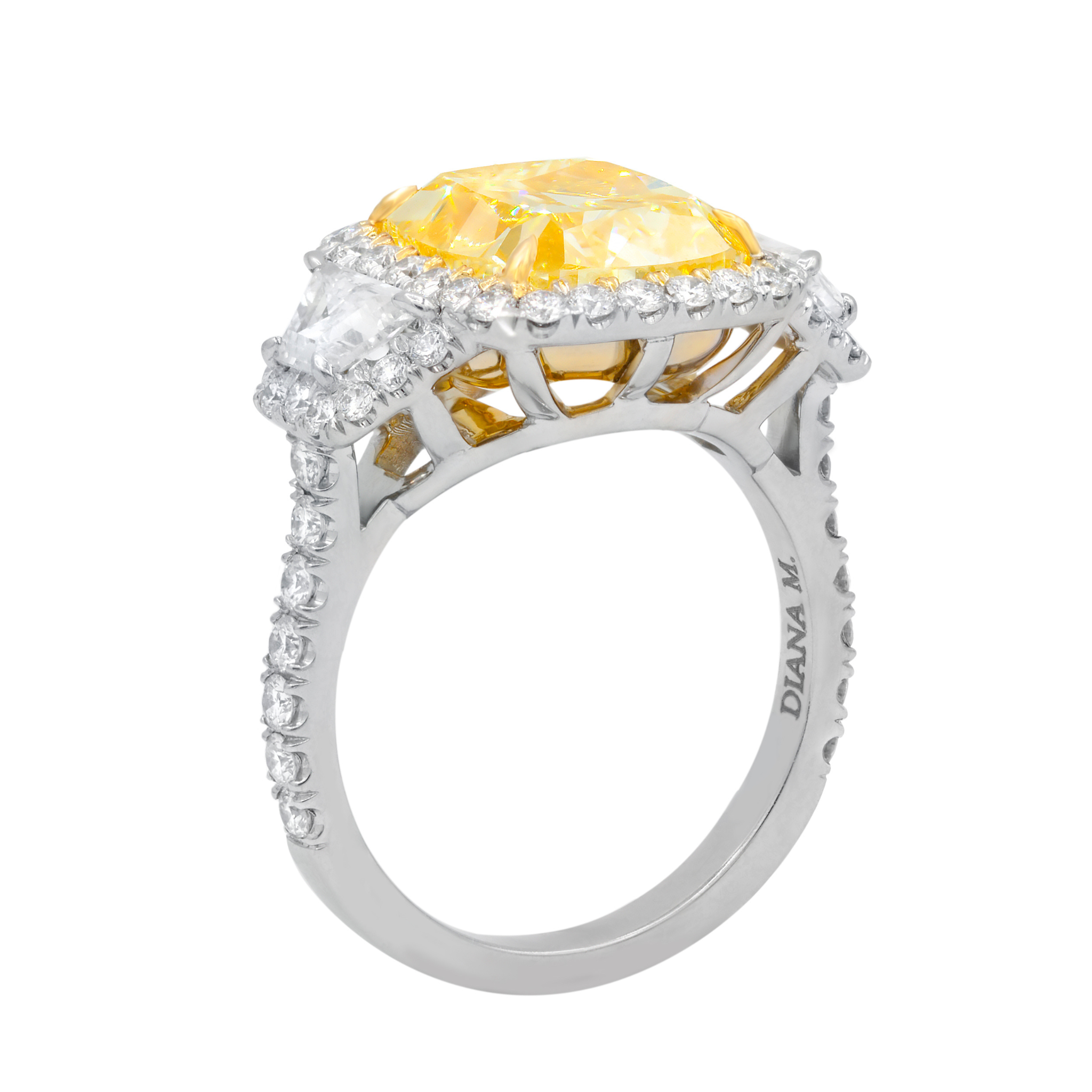 5.54ct fancy yellow cushion cut diamond halo ring in platinum and yellow gold