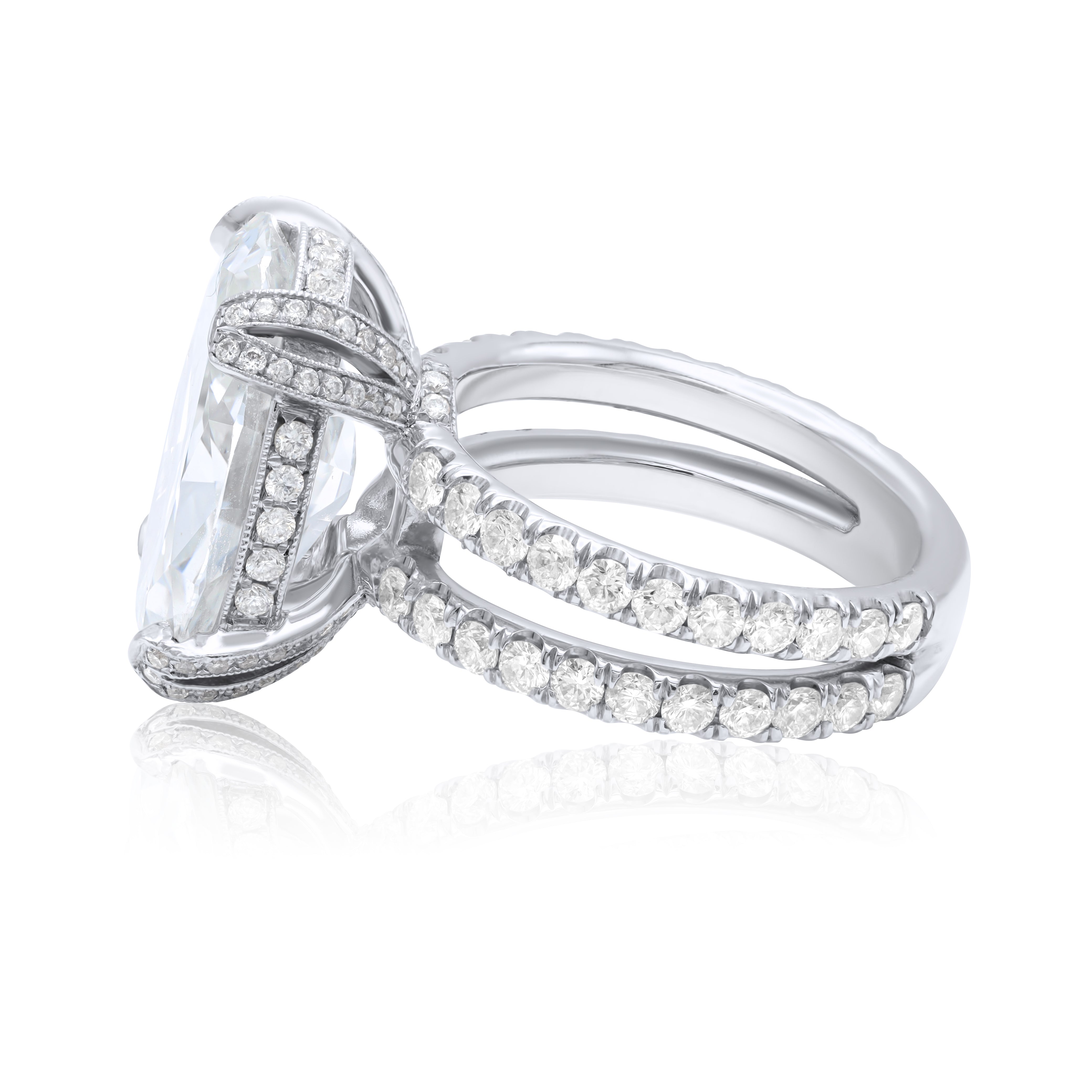 GIA certified platinum oval diamond engagement ring with 6.88ct H-VS2 center and pavé split shank