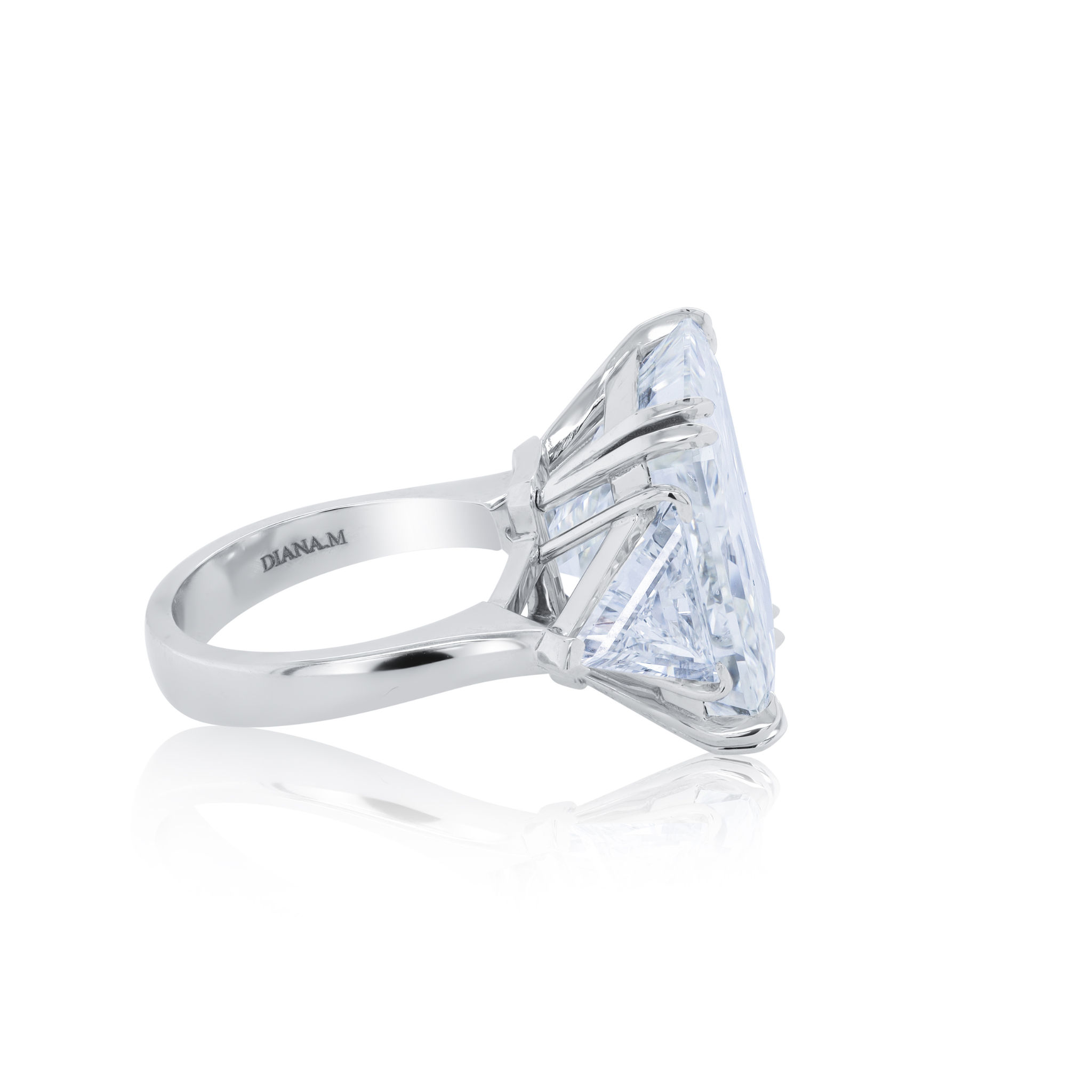 GIA certified radiant diamond three-stone platinum engagement ring