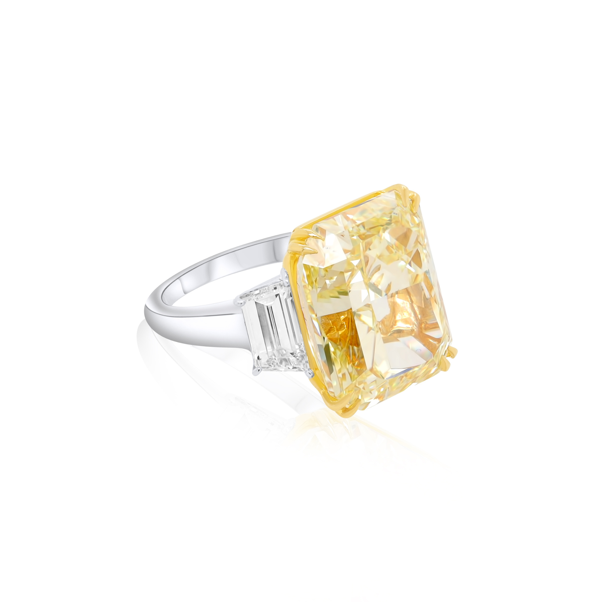 GIA certified three-stone yellow diamond ring in platinum and 18kt gold