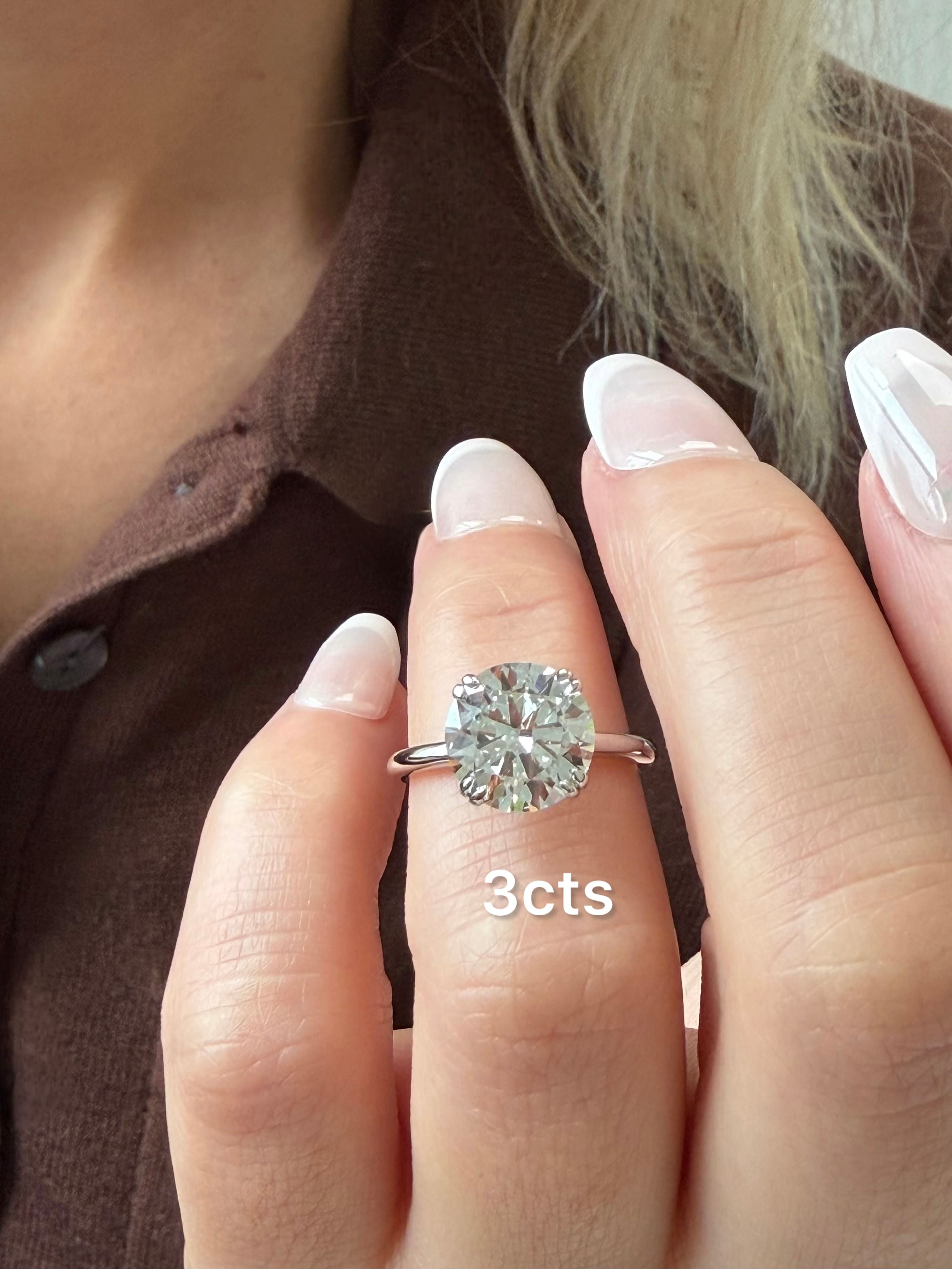 Lab Grown Round Split Claw Engagement Ring