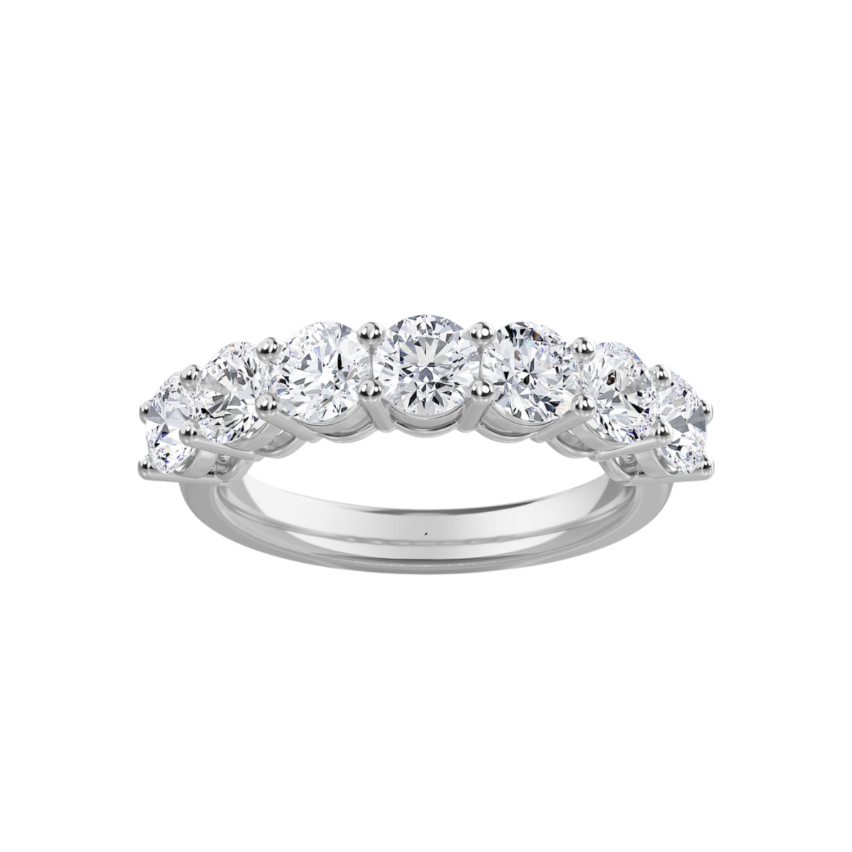 A 14kt white gold band ring with seven round lab grown diamonds set in it.