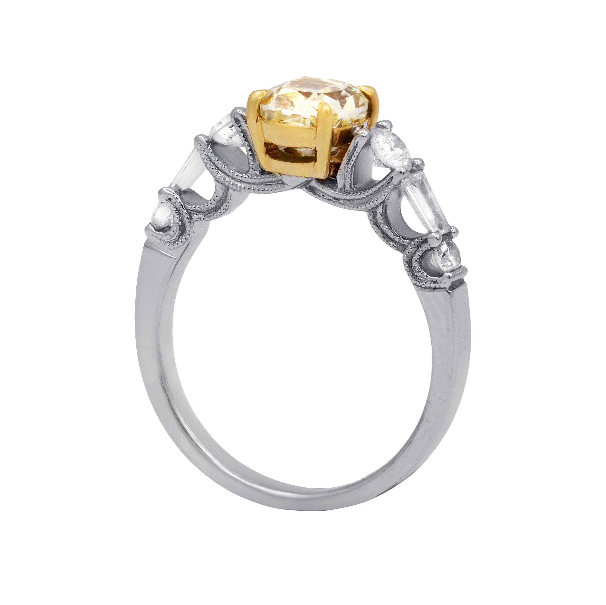Oval fancy yellow diamond ring in dual-tone gold