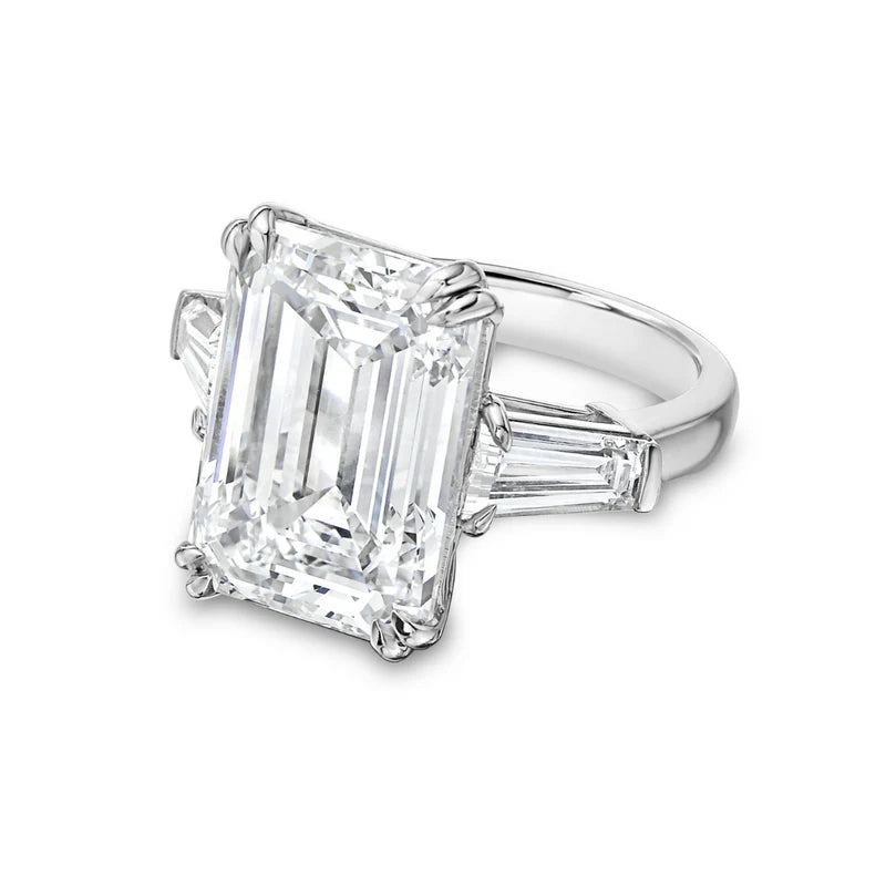 Platinum emerald cut diamond ring with tapered baguettes