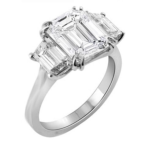 Platinum emerald cut three-stone engagement ring
