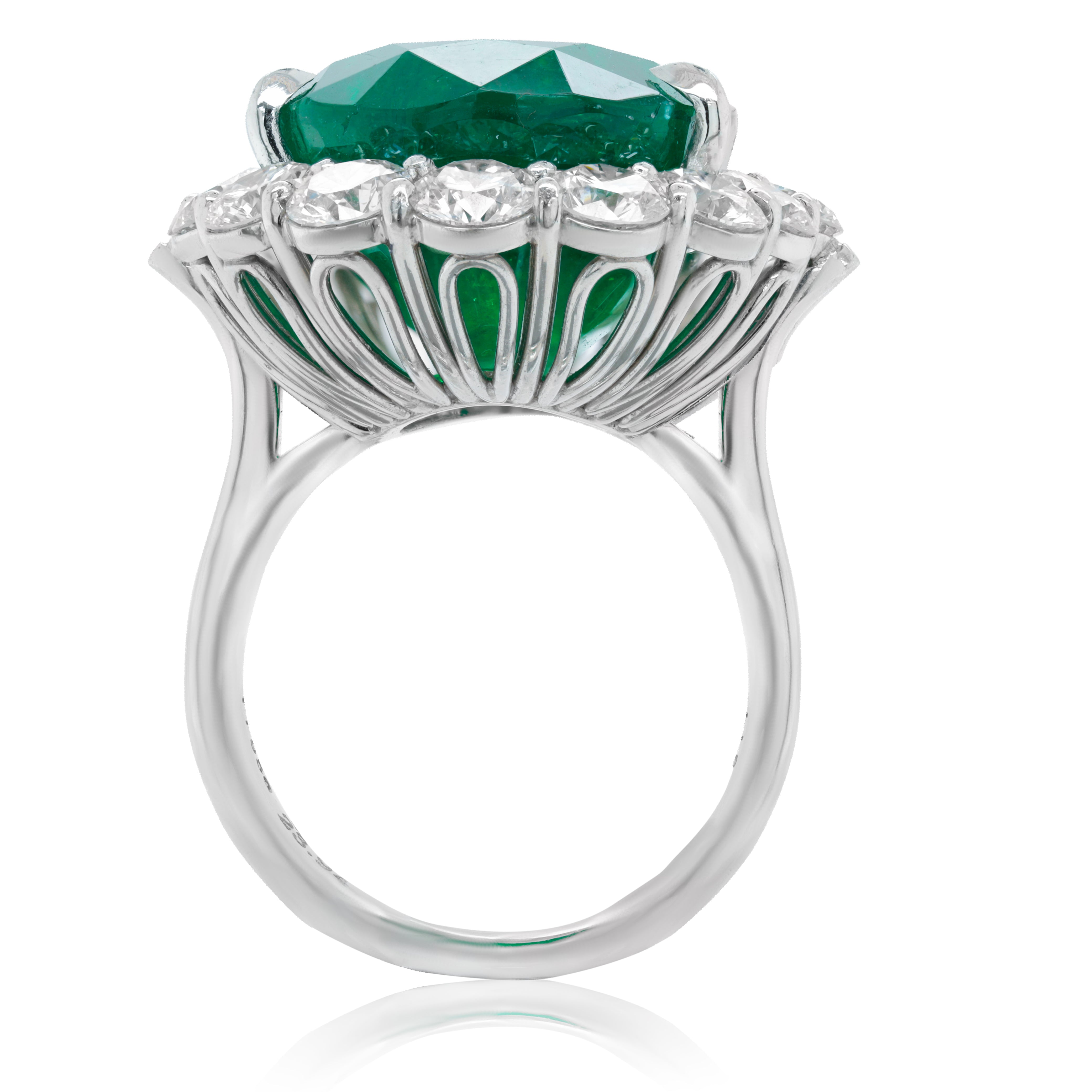 Platinum oval cut natural green emerald halo ring with 23.98ct emerald and 4.25ct round diamonds