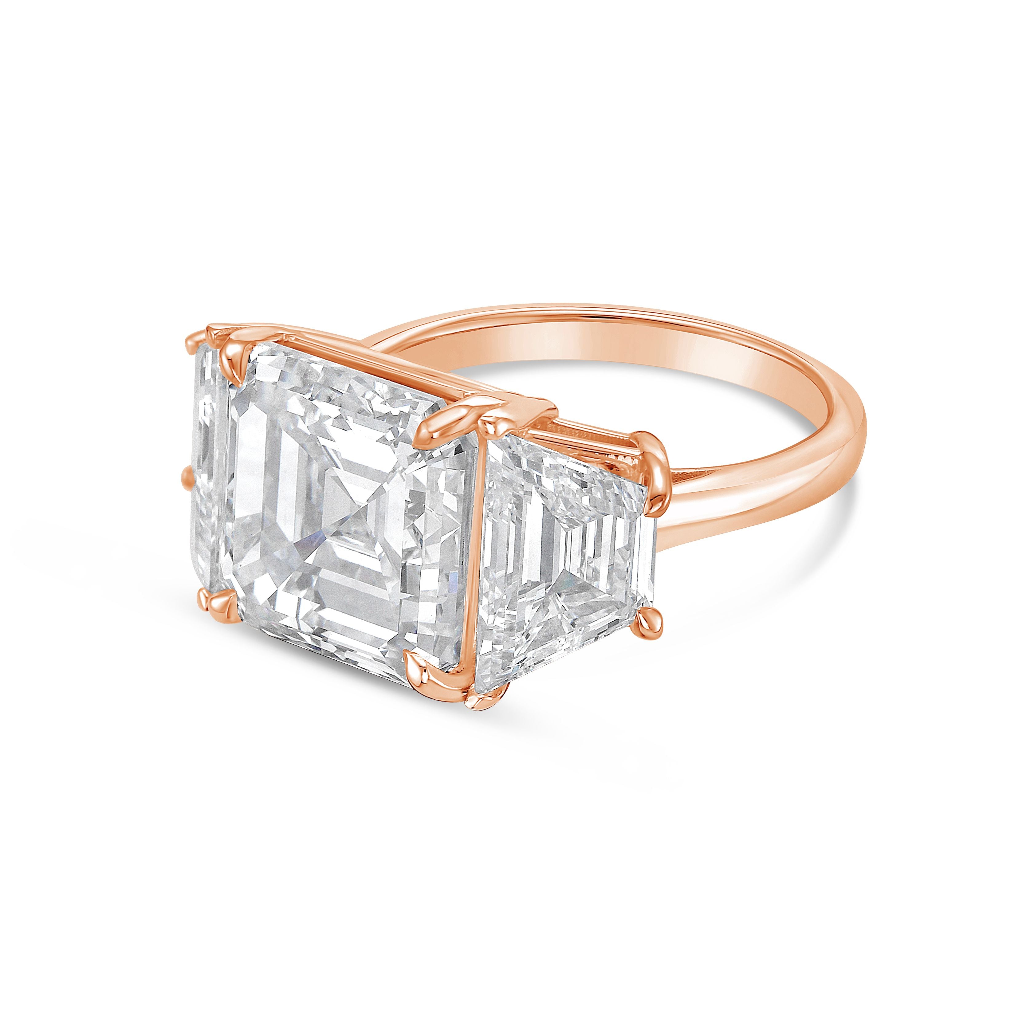 Rose gold ring with emerald-cut diamond on a white background