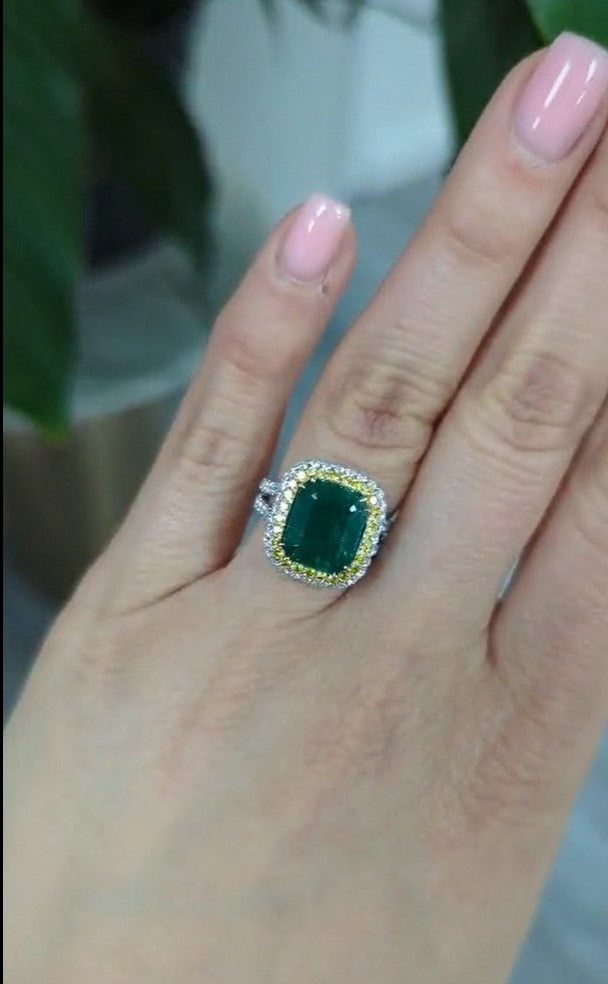 Yellow Diamond Halo Emerald Ring