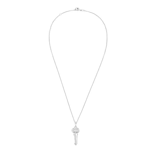 Silver necklace with a key-shaped pendant on a white background