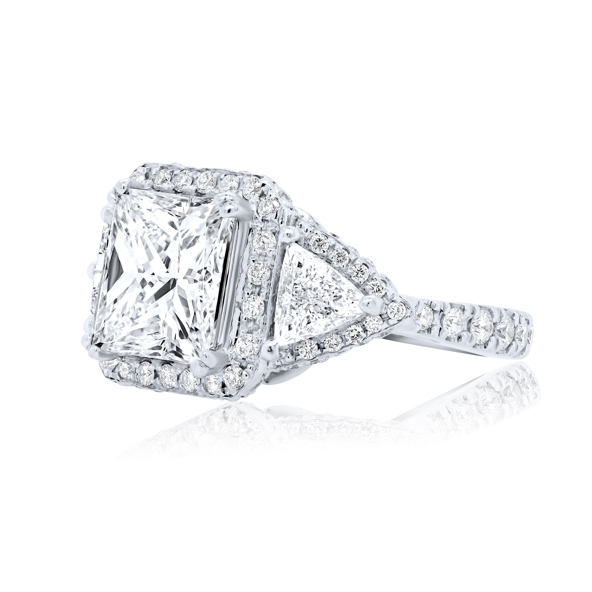 Three-stone princess cut halo diamond ring in white gold