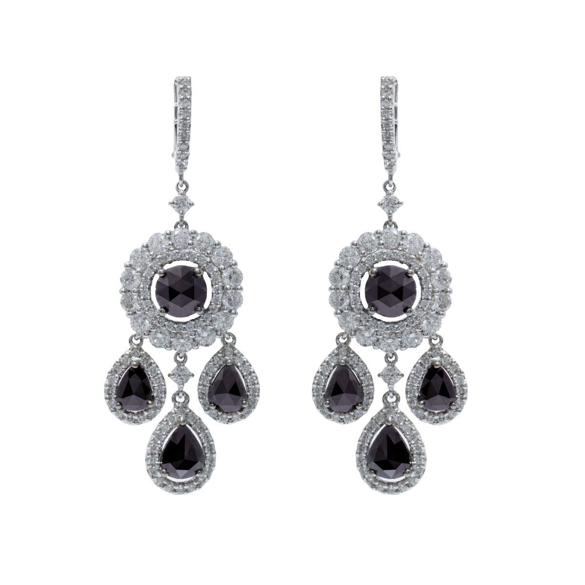 black diamond earrings in ear