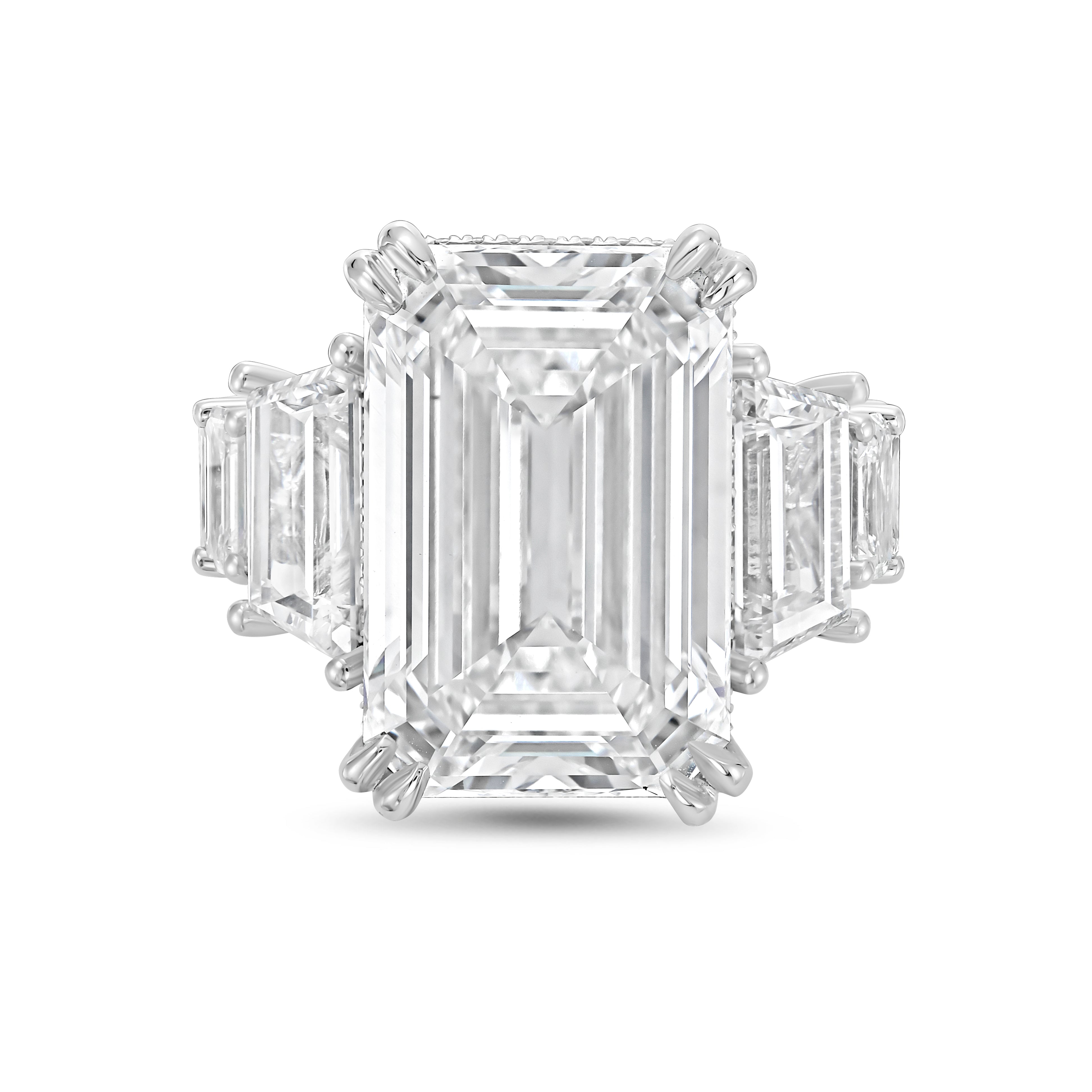 Lab-grown emerald cut diamond ring in 18k white gold with hidden halo and green emerald accents