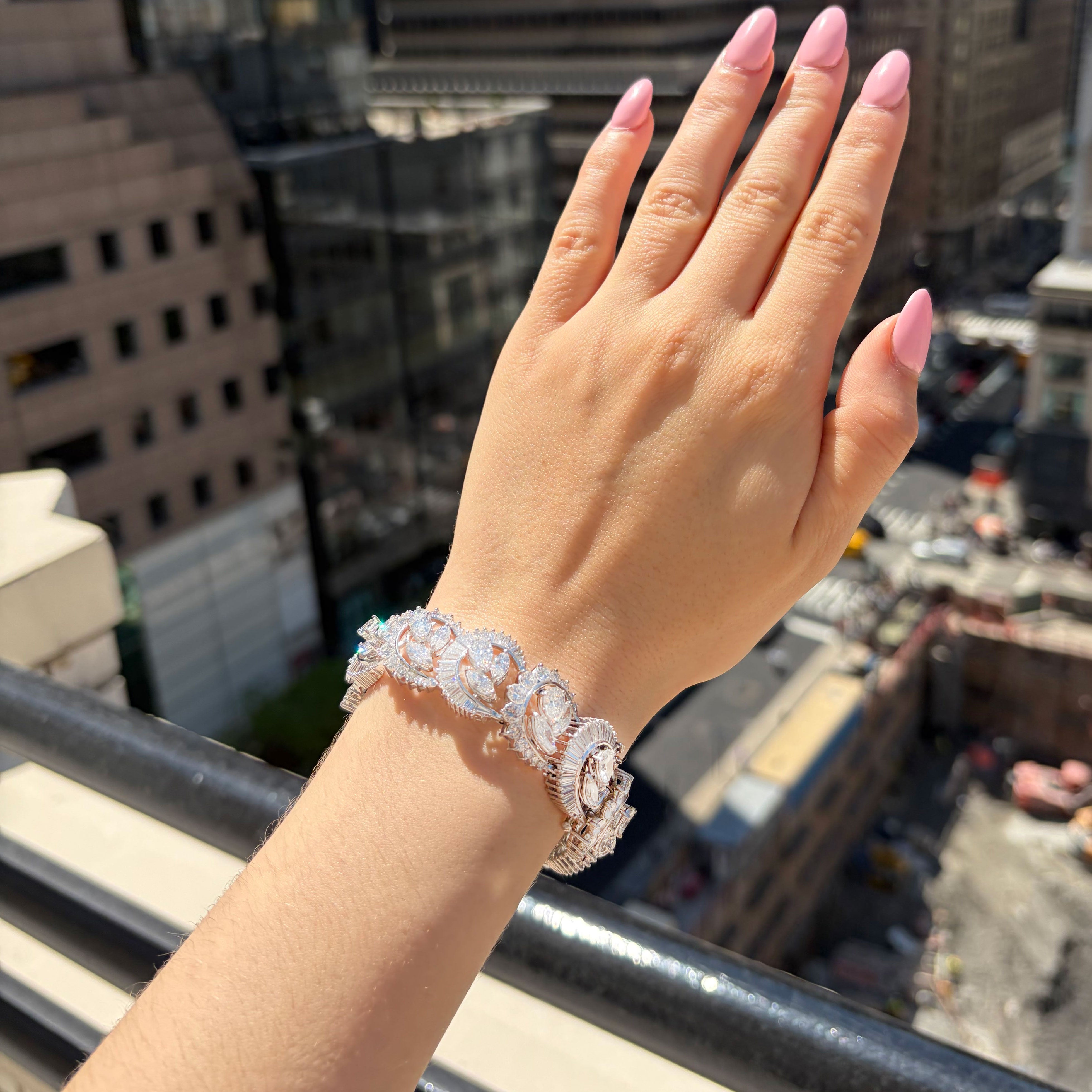 Multi-shape diamond bracelet styled on wrist