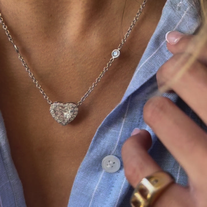 Halo heart diamond pendant with diamonds-by-the-yard chain, 6.94ct total weight