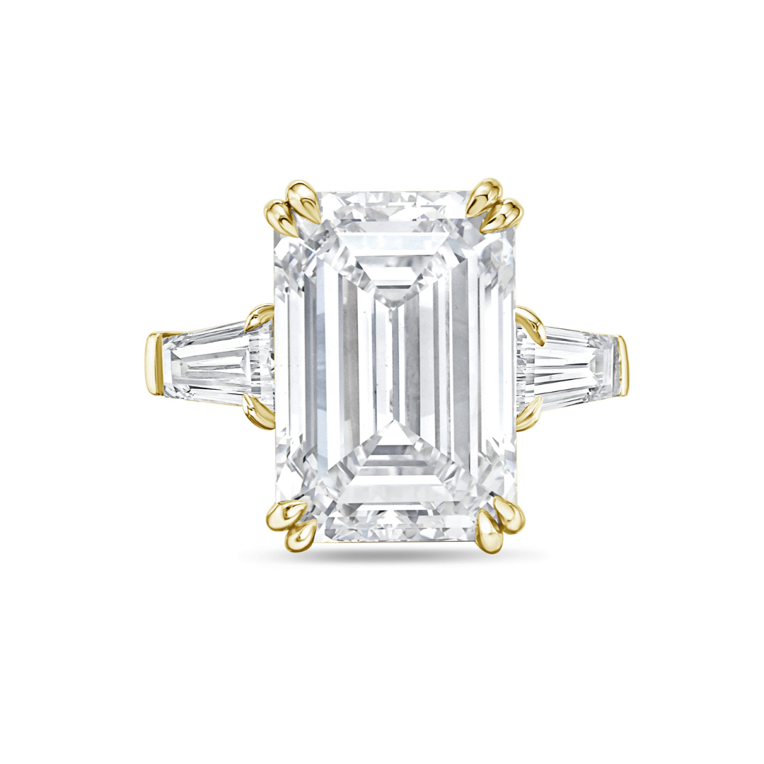 three stone emerald cut ring