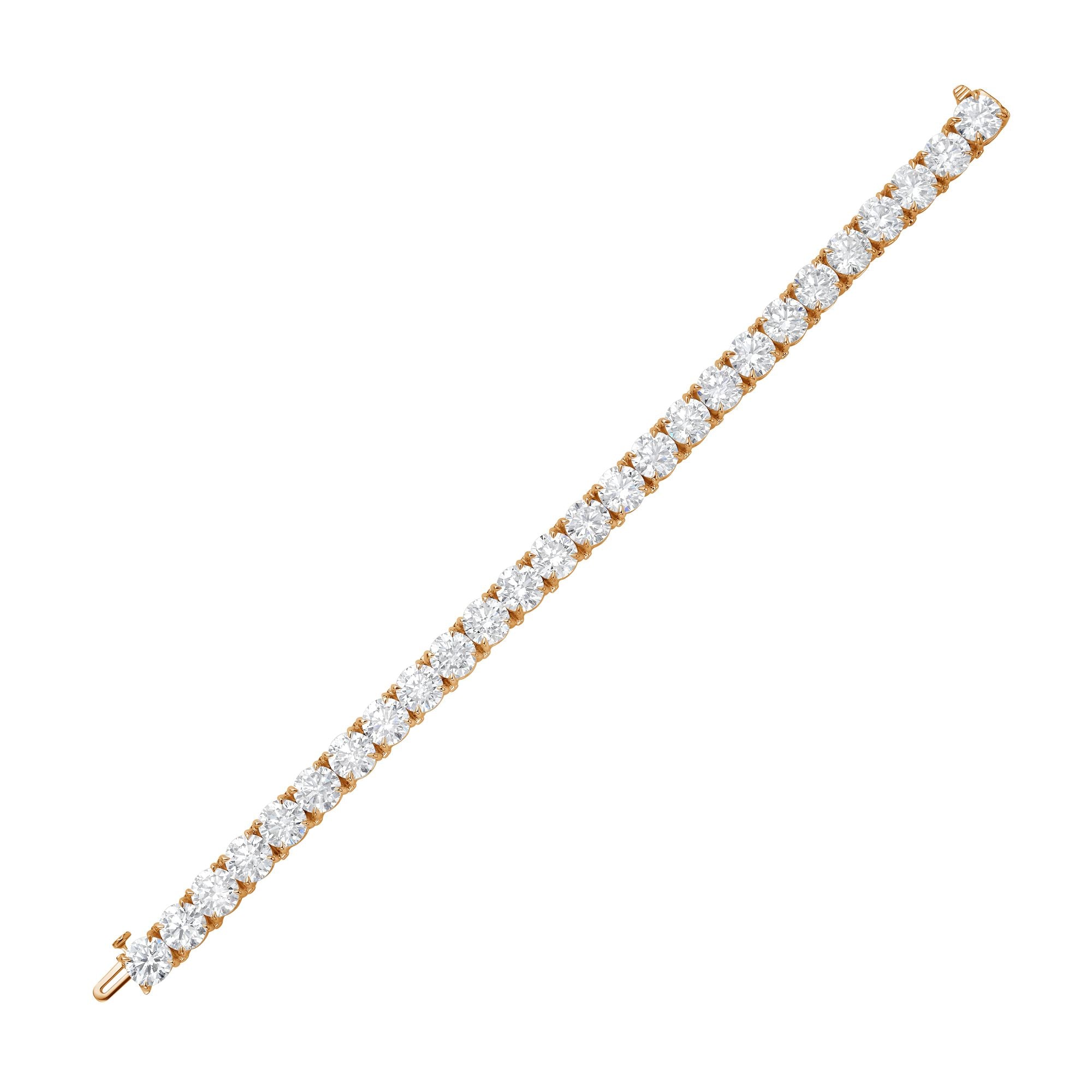 Gold bracelet with diamonds on a white background