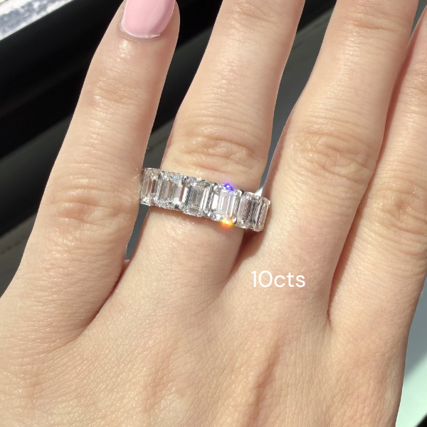 Diamond ring with 10 carats on a hand