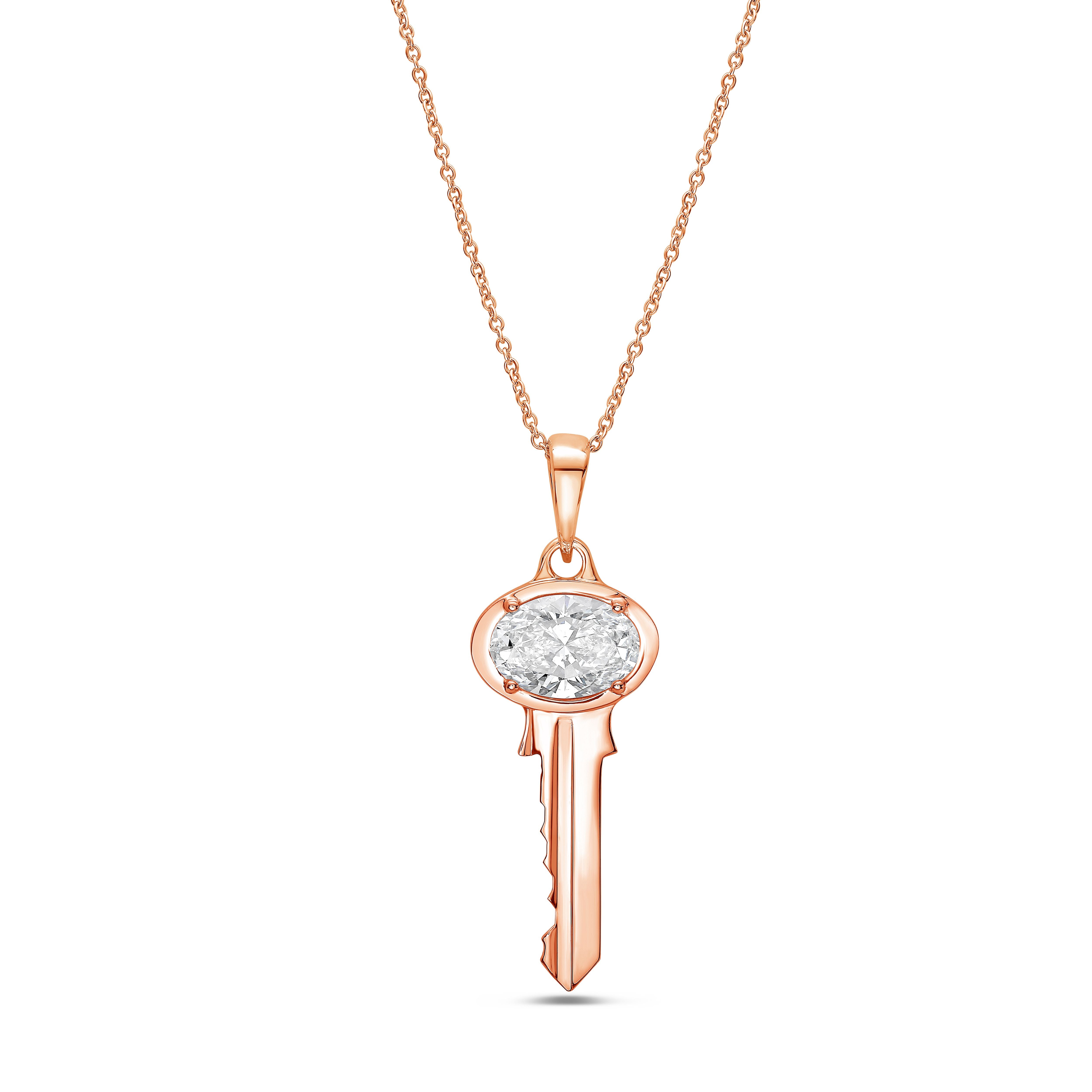 14K gold key pendant with oval diamond and adjustable chain