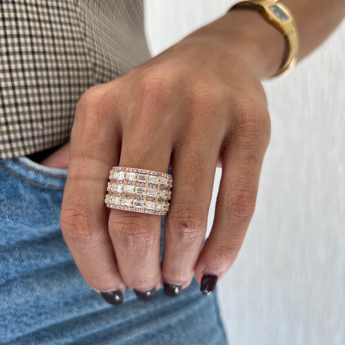 18K rose gold eternity band with three rows of emerald-cut diamonds and round pink diamond accents, 11.23ct total