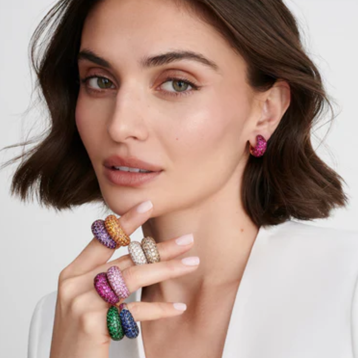 18K rose gold orange sapphire dome ring with 10.50ct round orange sapphires, sizes 5.5–7.5