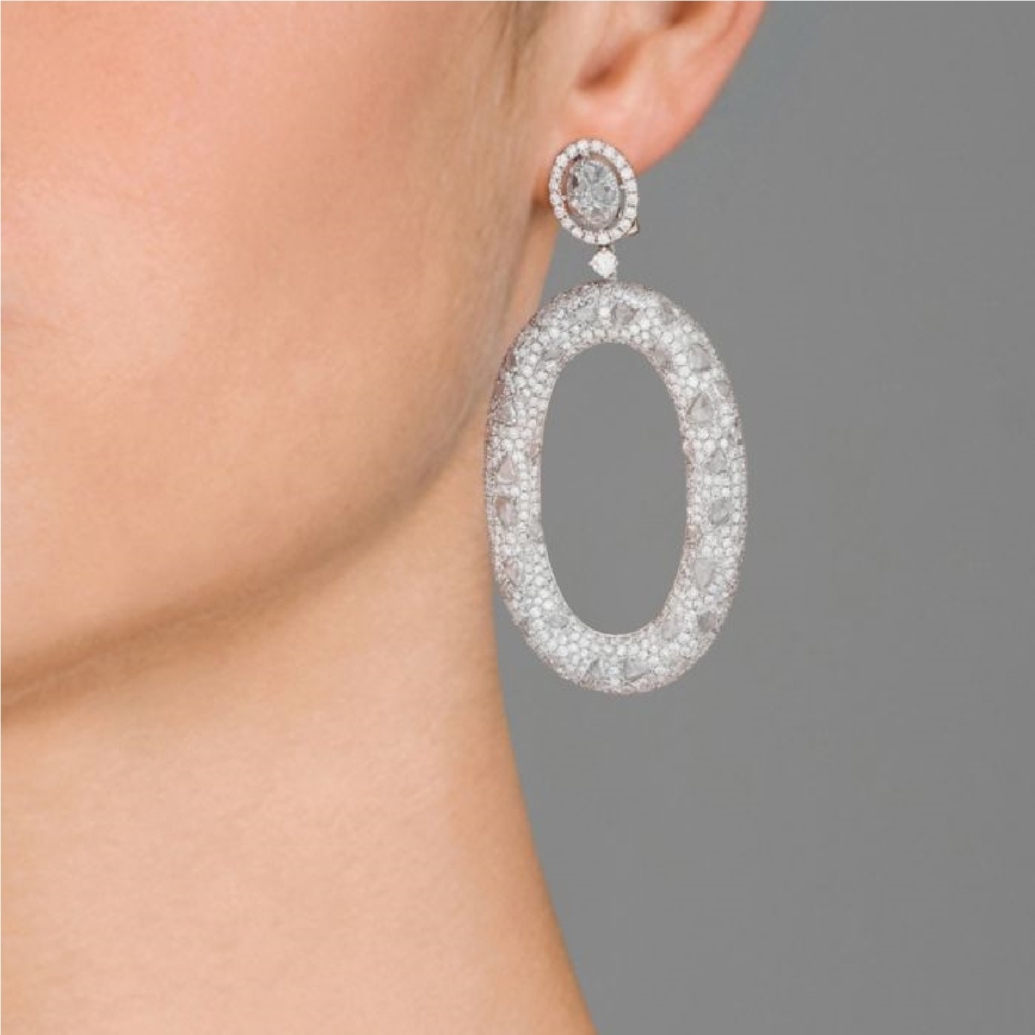 18 kt white gold diamond fashion earrings adorned with 13.48 cts tw of diamonds of various size and shape.jpg