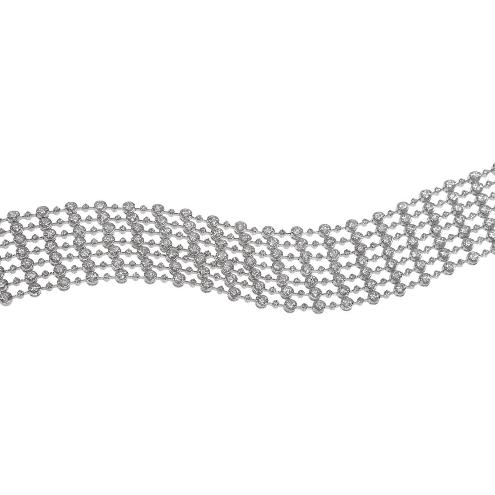 18kt white gold seven row bracelet featuring 13.00 cts of round diamonds.jpg