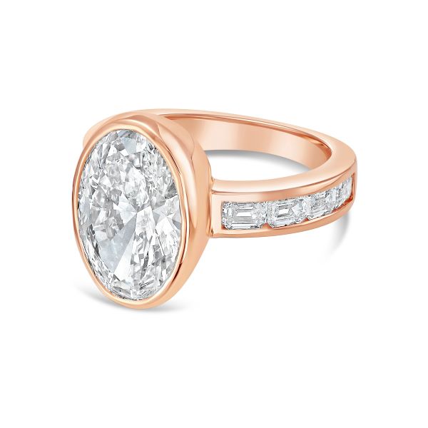 Lab Grown Bezel Oval Diamond Ring with Emerald Accents