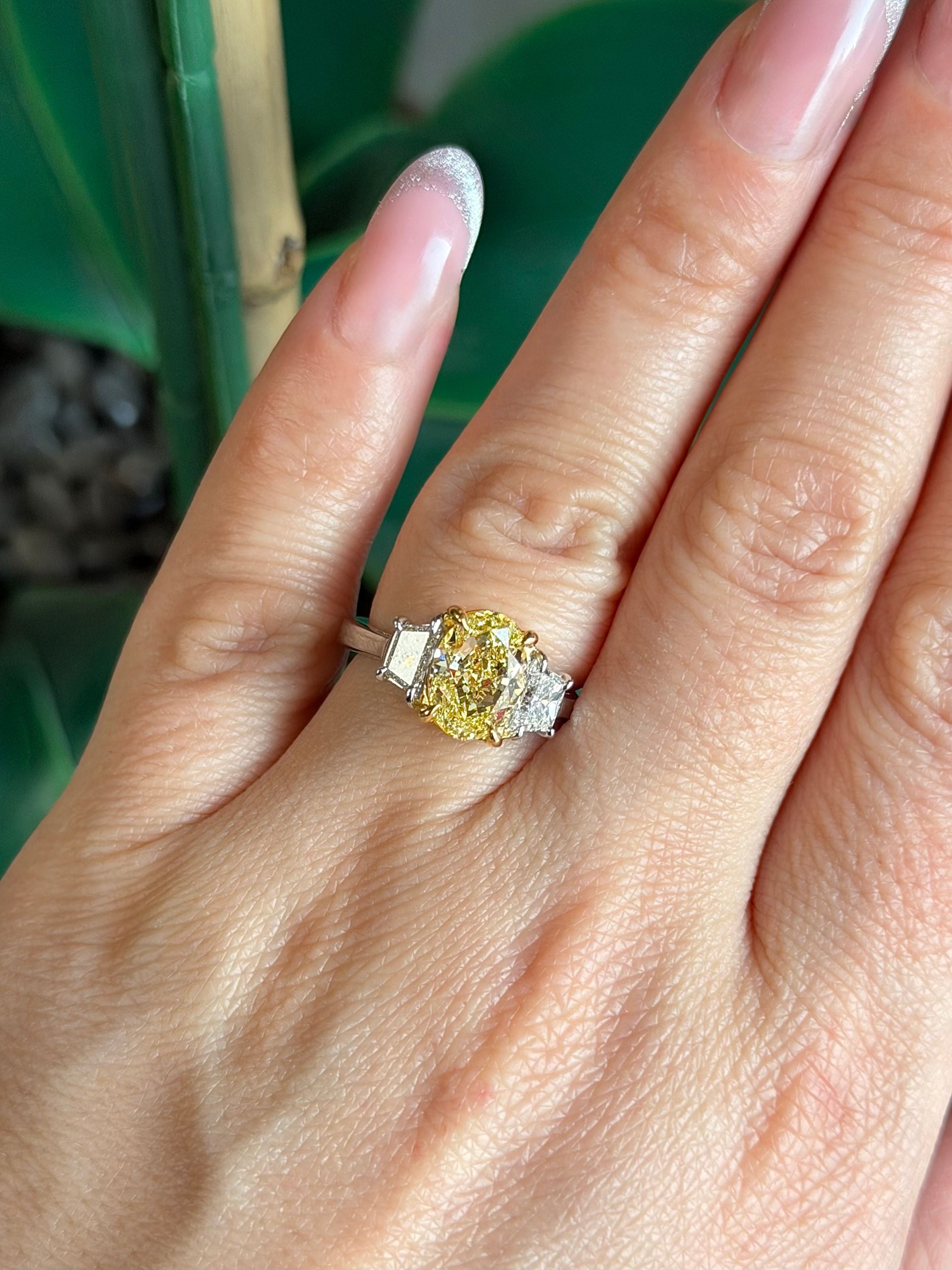 Fancy Yellow Oval With Side trapezoid Diamonds Ring