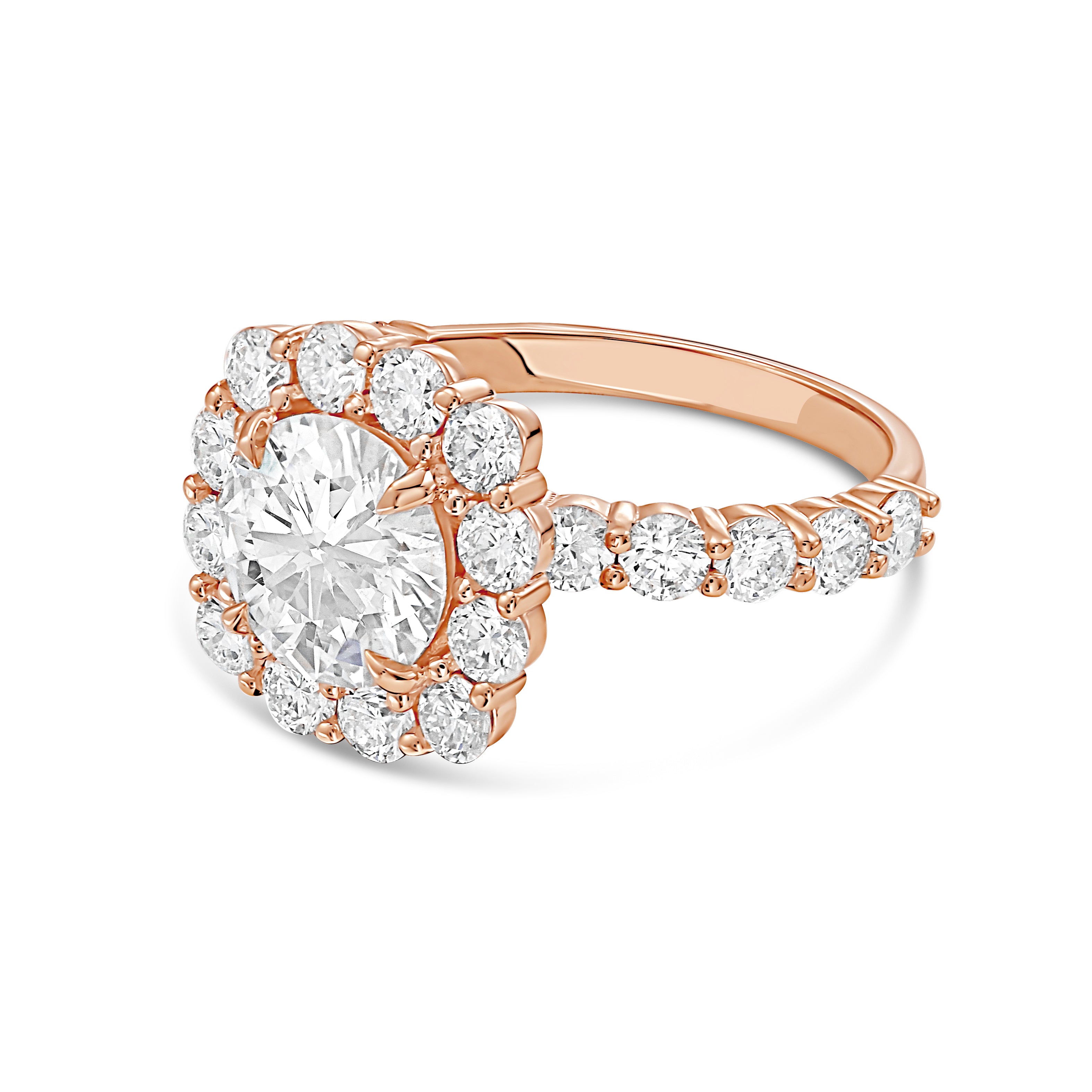 Lab-grown round diamond halo ring in 18kt rose gold, angled view showing graduating band accent stones
