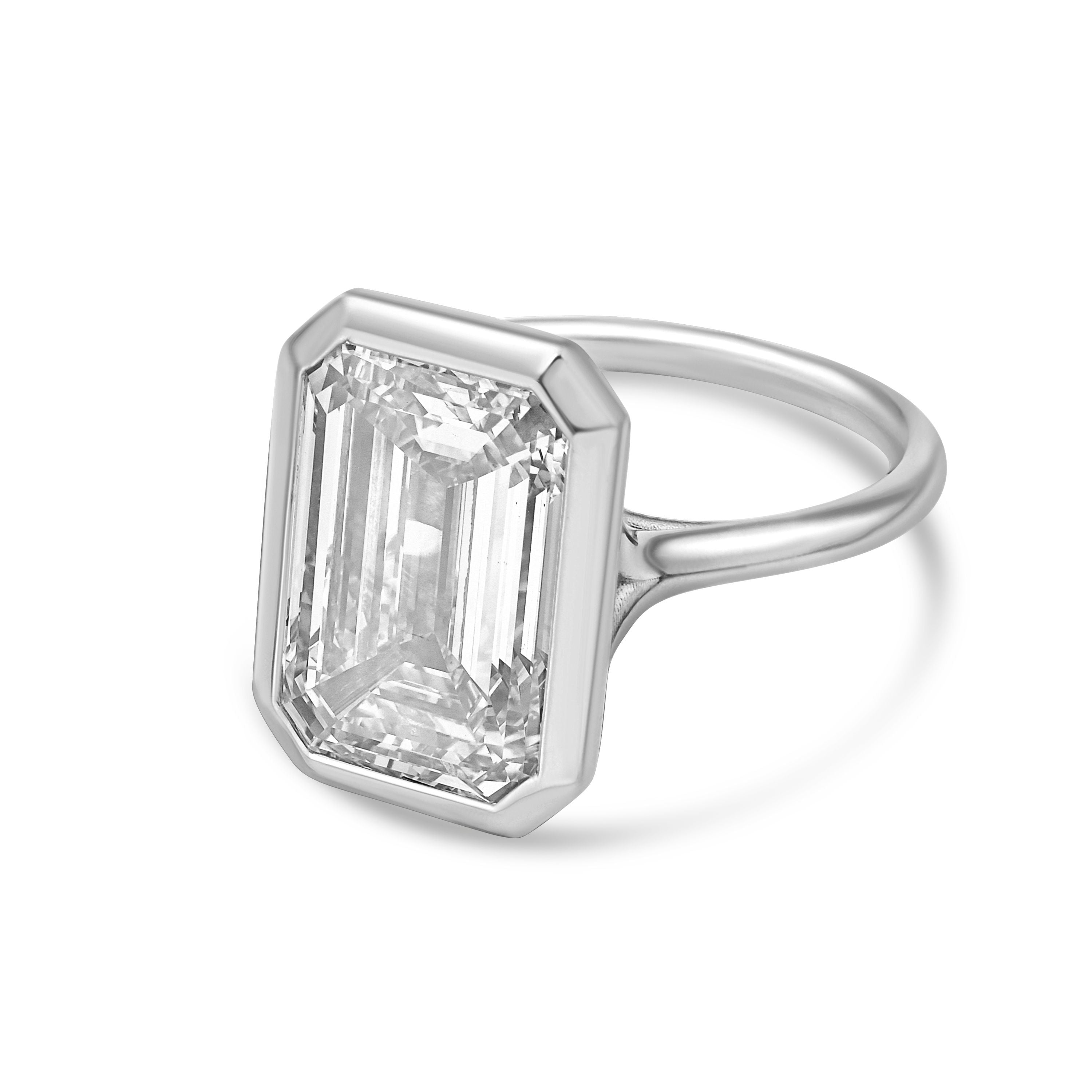 Emerald-cut bezel engagement ring in 18K white gold, low profile