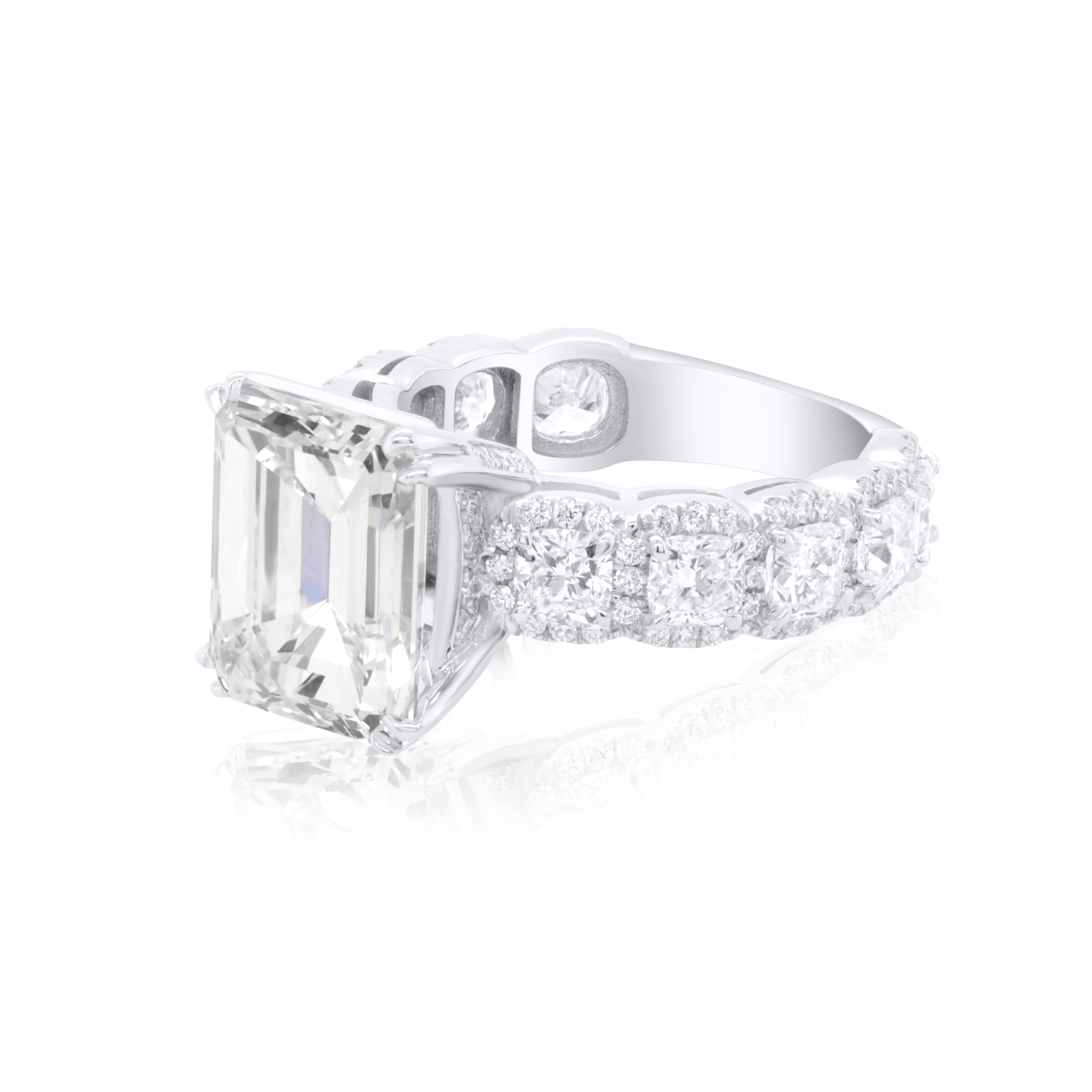 Emerald cut diamond ring with pavé band