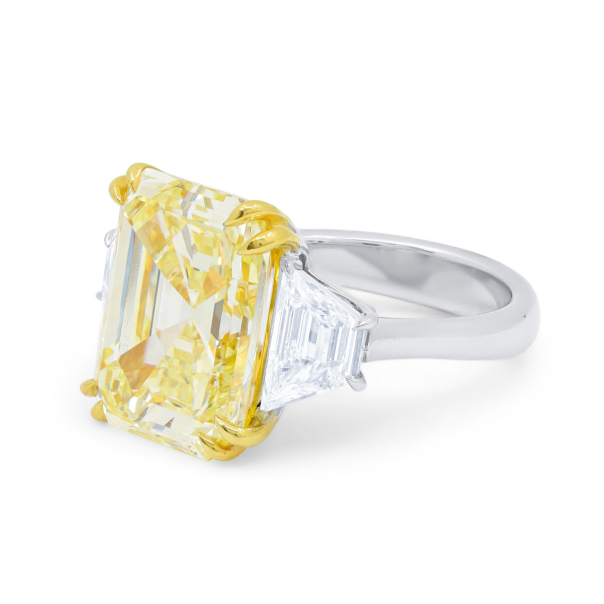 GIA certified emerald cut yellow diamond in platinum and gold