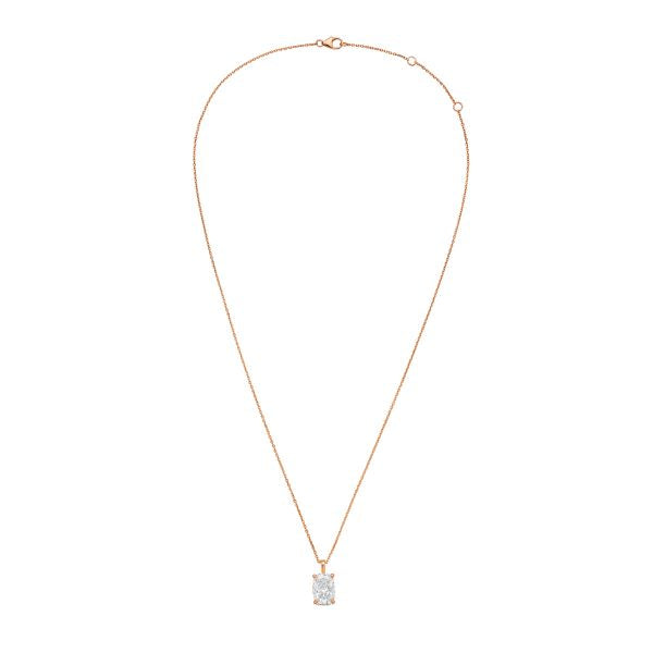 Gold necklace with a diamond pendant on a white background