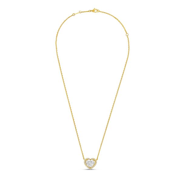 Gold necklace with a heart-shaped pendant on a white background