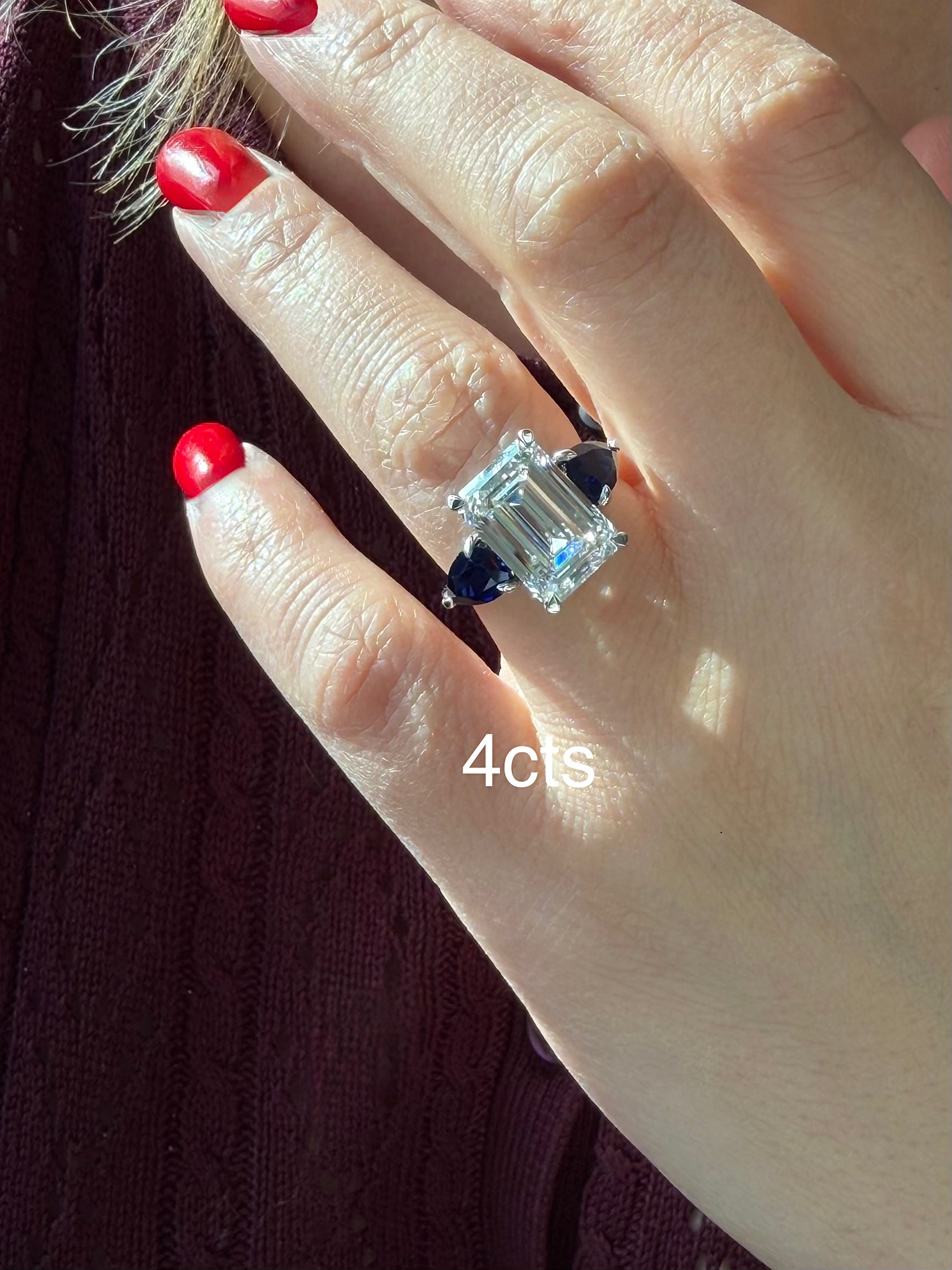 Lab Grown Emerald Diamond ring with pear shaped sapphires