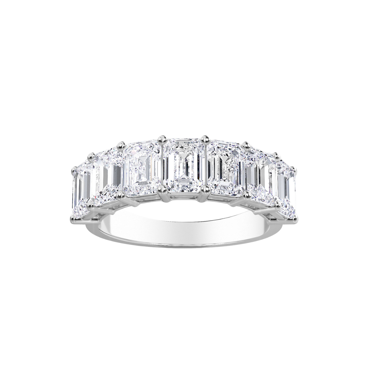 A 14kt white gold lab grown diamond emerald 7 stone band ring.