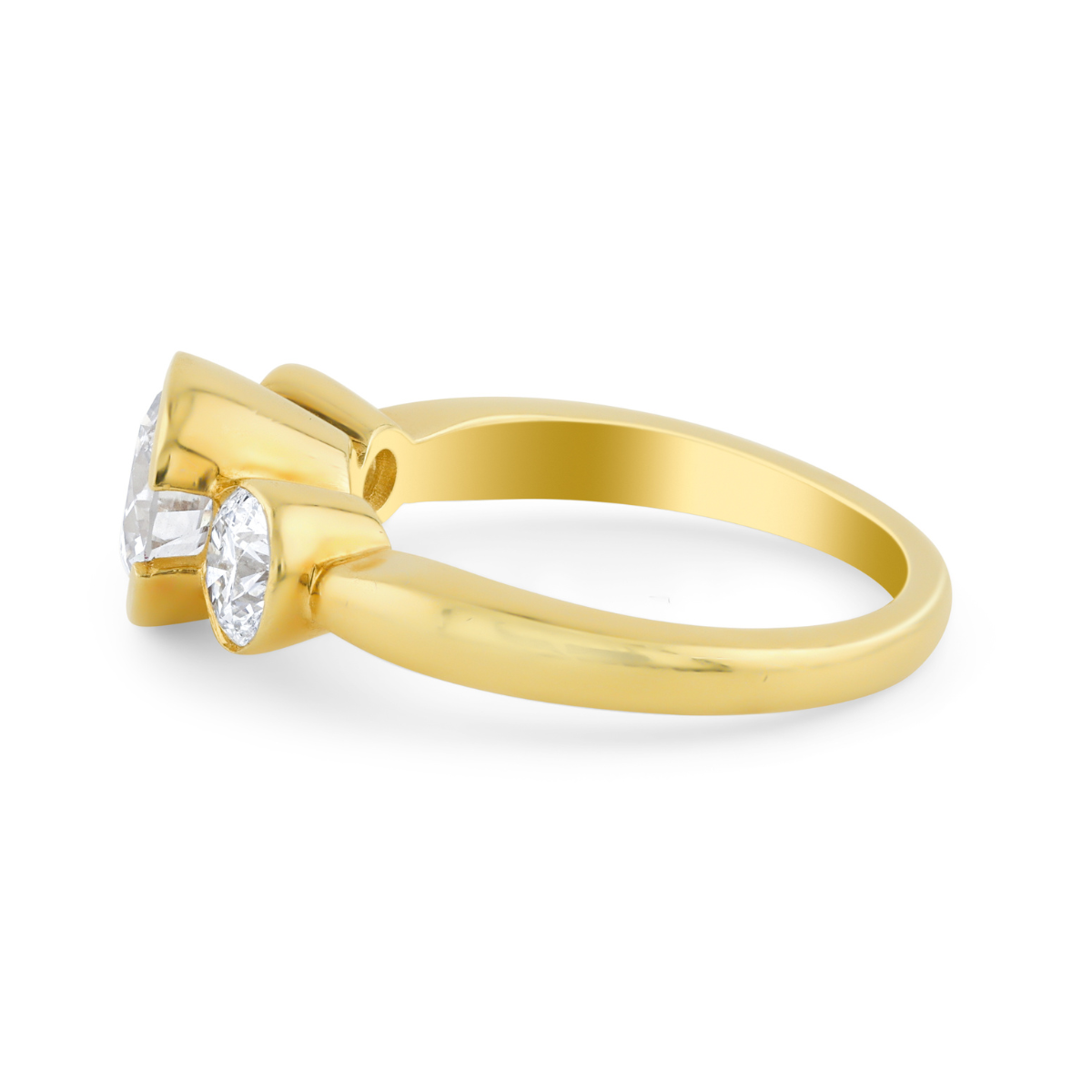Minimalist three stone bezel engagement ring