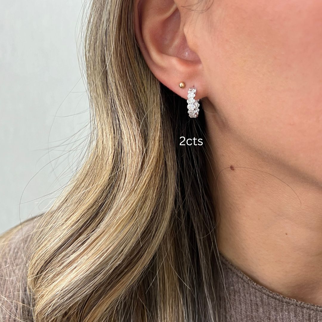 Oval diamond huggie earrings