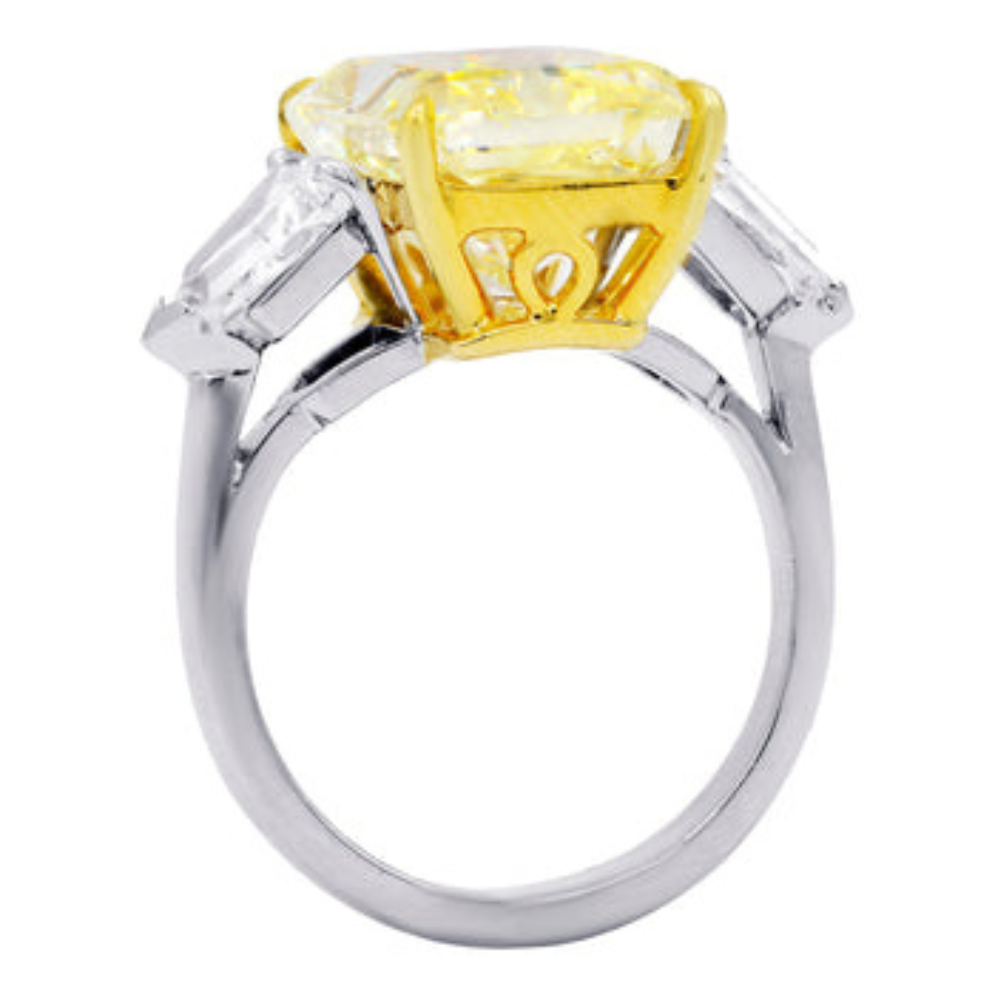 Platinum and yellow gold radiant cut yellow diamond engagement ring