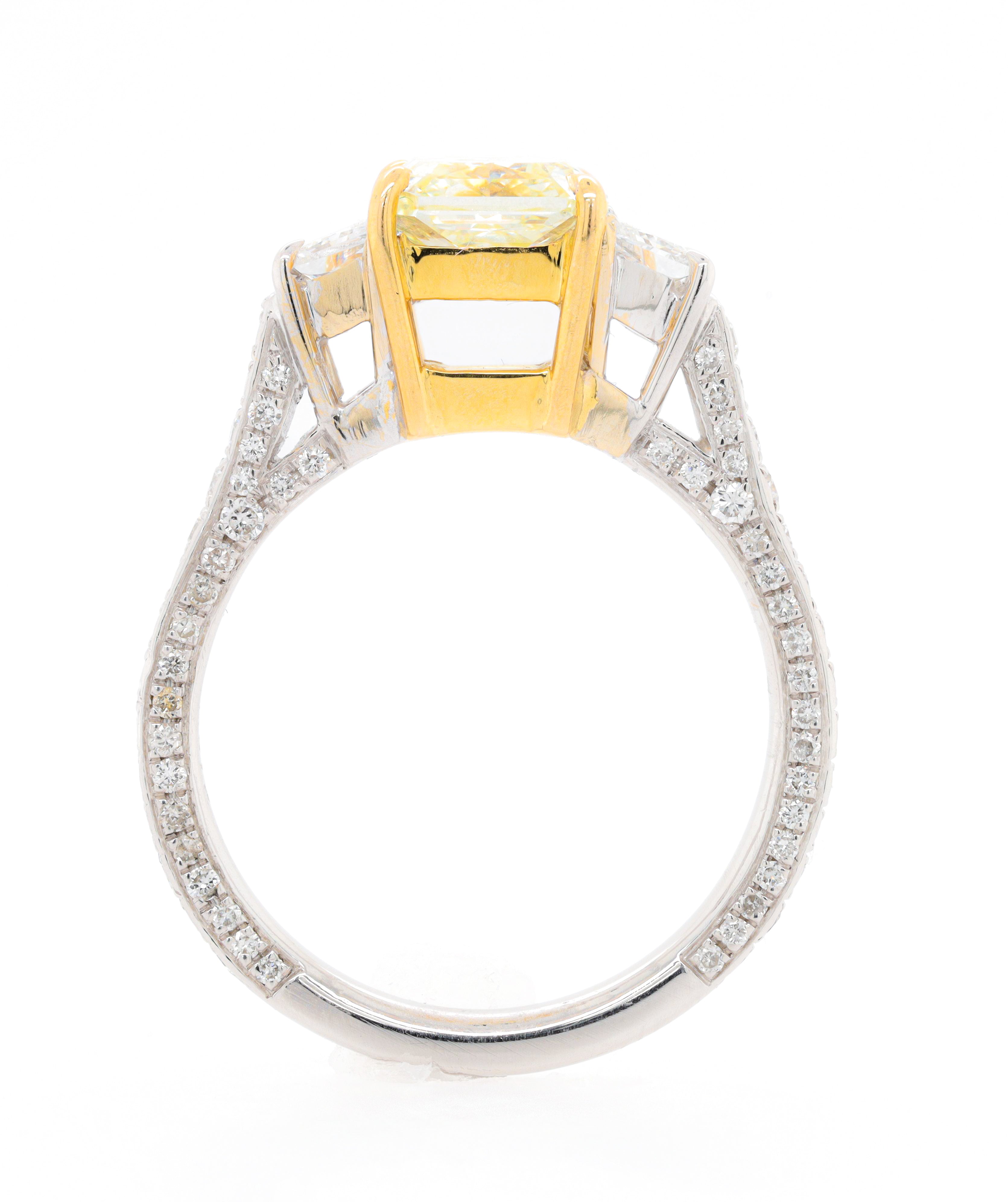 Platinum and yellow gold radiant engagement ring