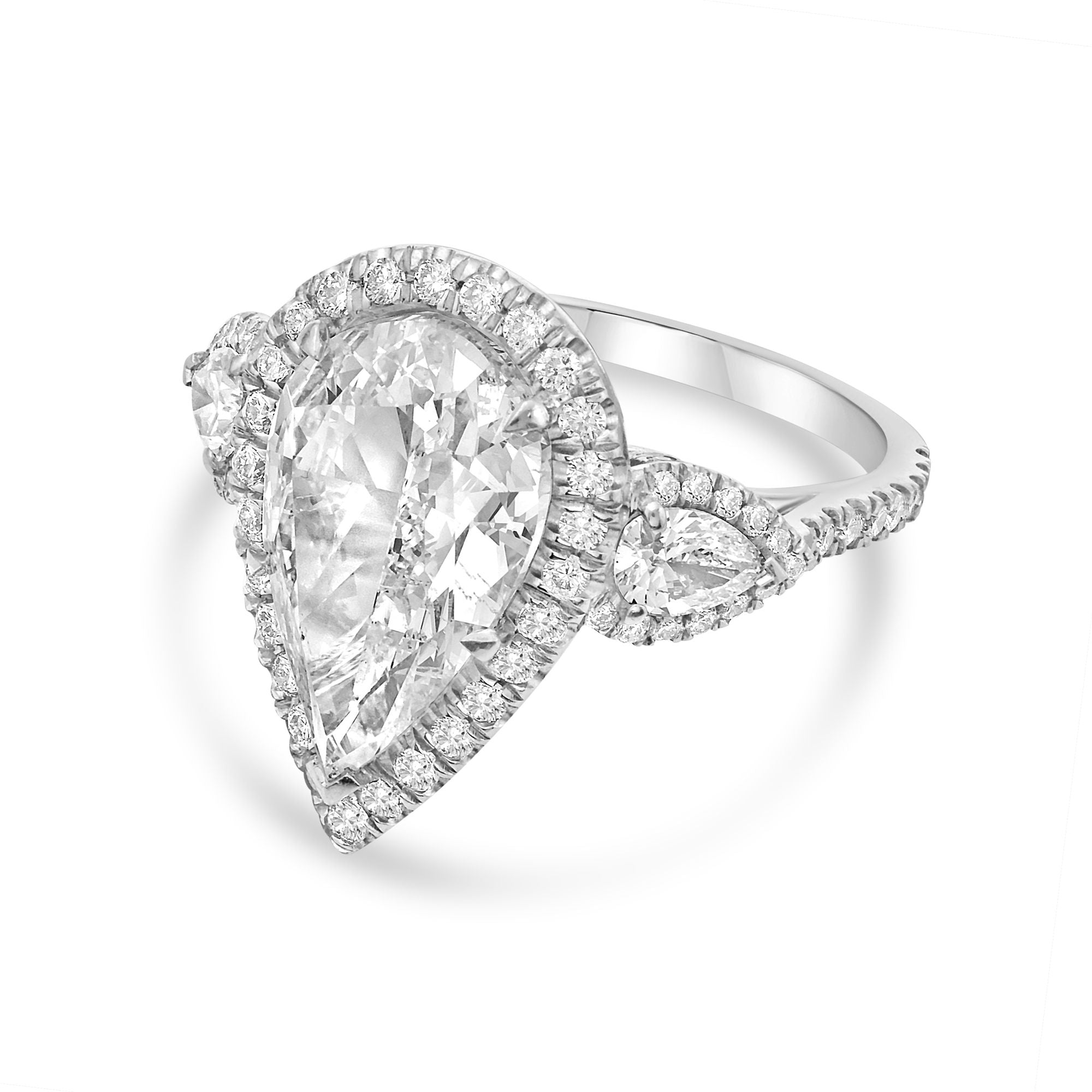 Platinum pear-shaped engagement ring with halo