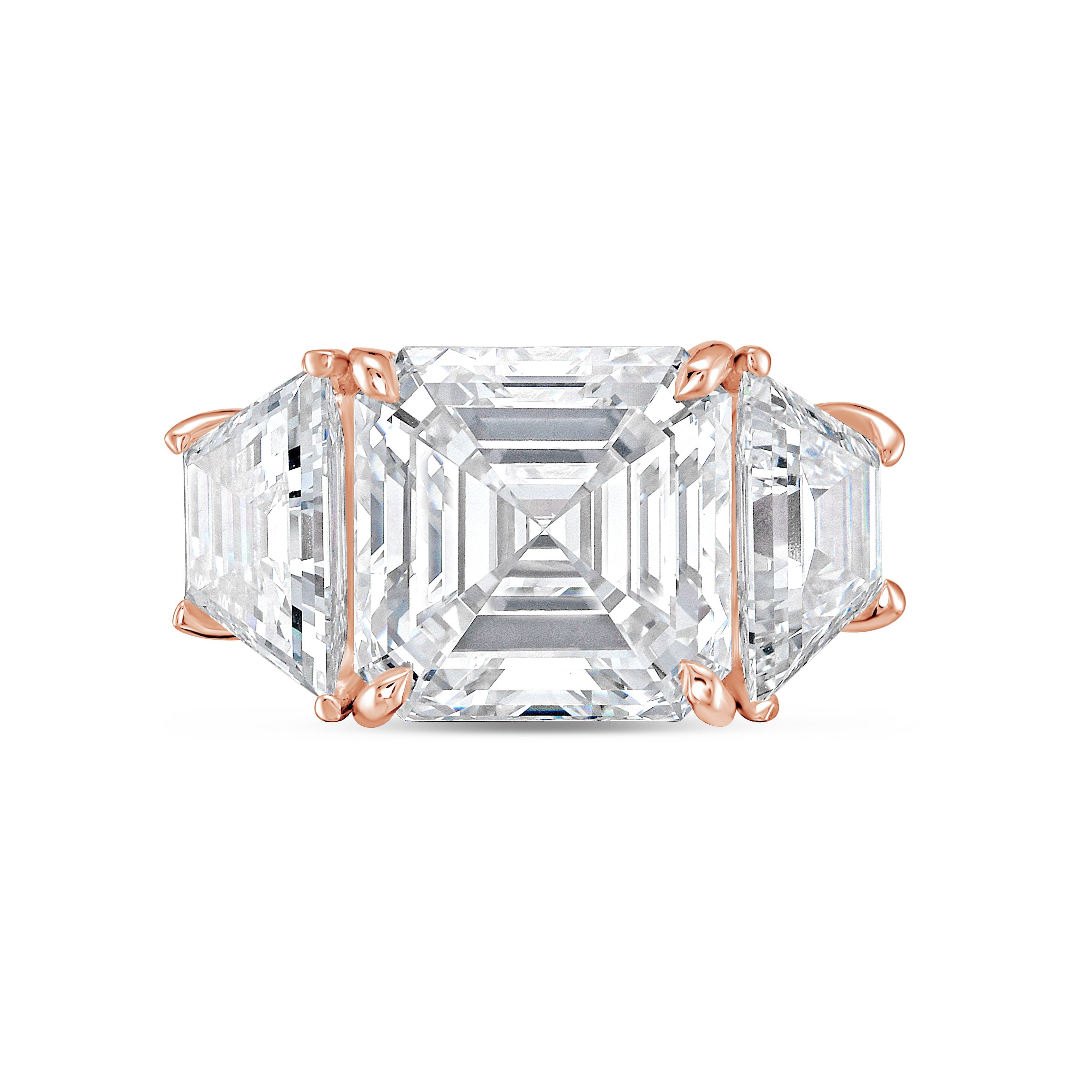 Rose gold ring with a large rectangular diamond on a white background